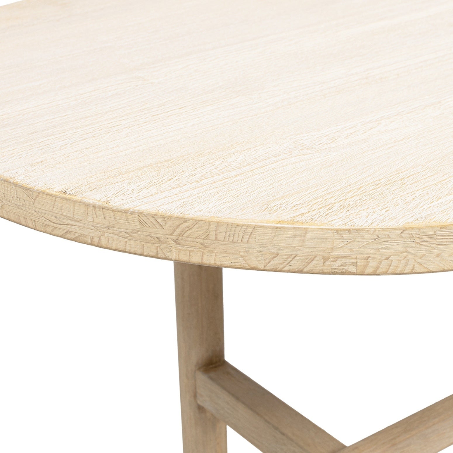 Close-up of the cerused pine tabletop edge and limed grain