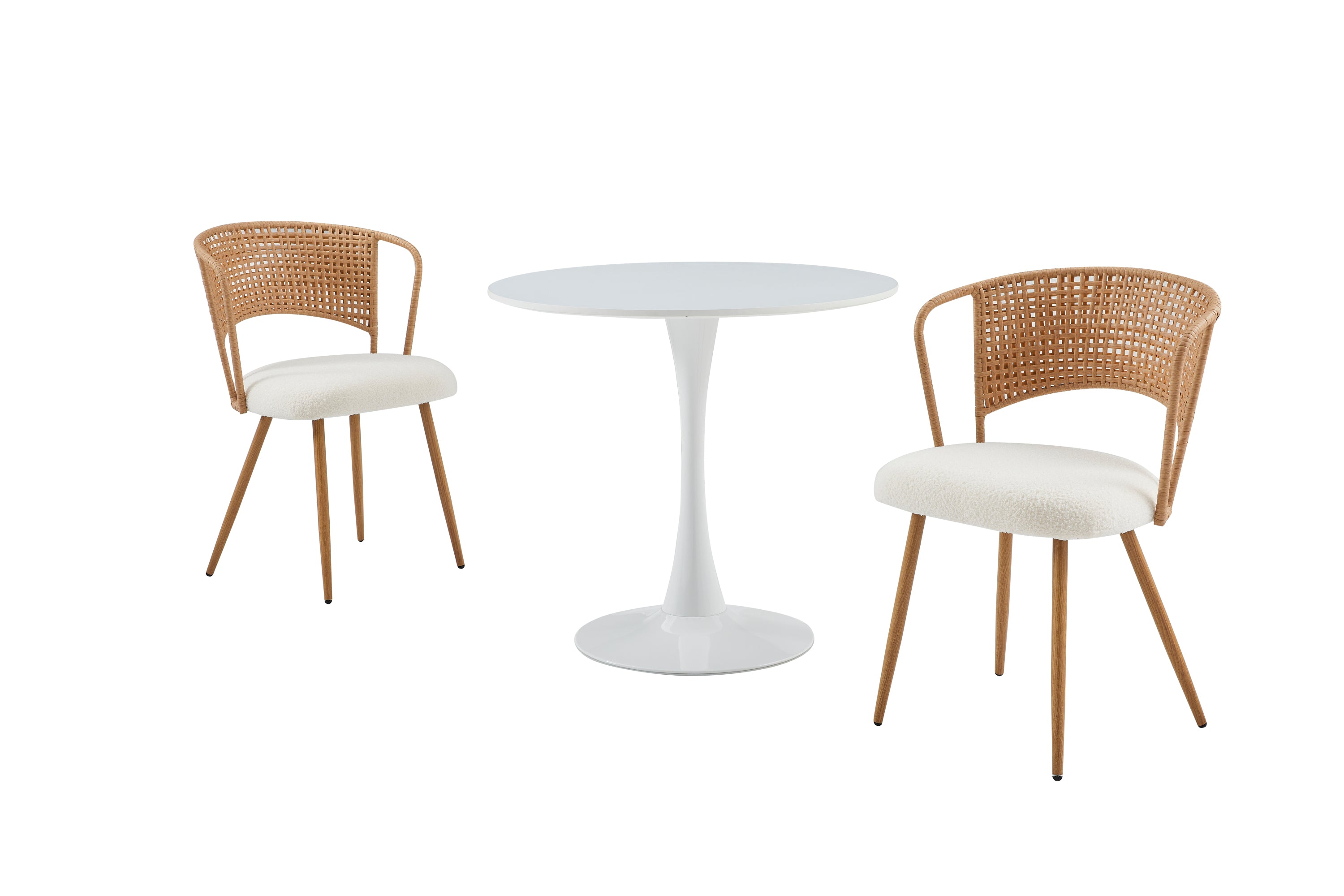 White round dining table with white tulip base flanked by two rattan boucle chairs, studio