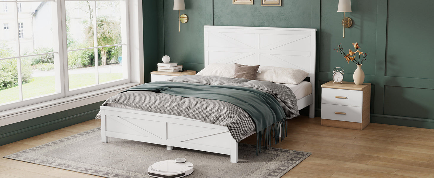 Angled foot-of-bed view of the white pine queen bed frame with a nightstand and layered bedding