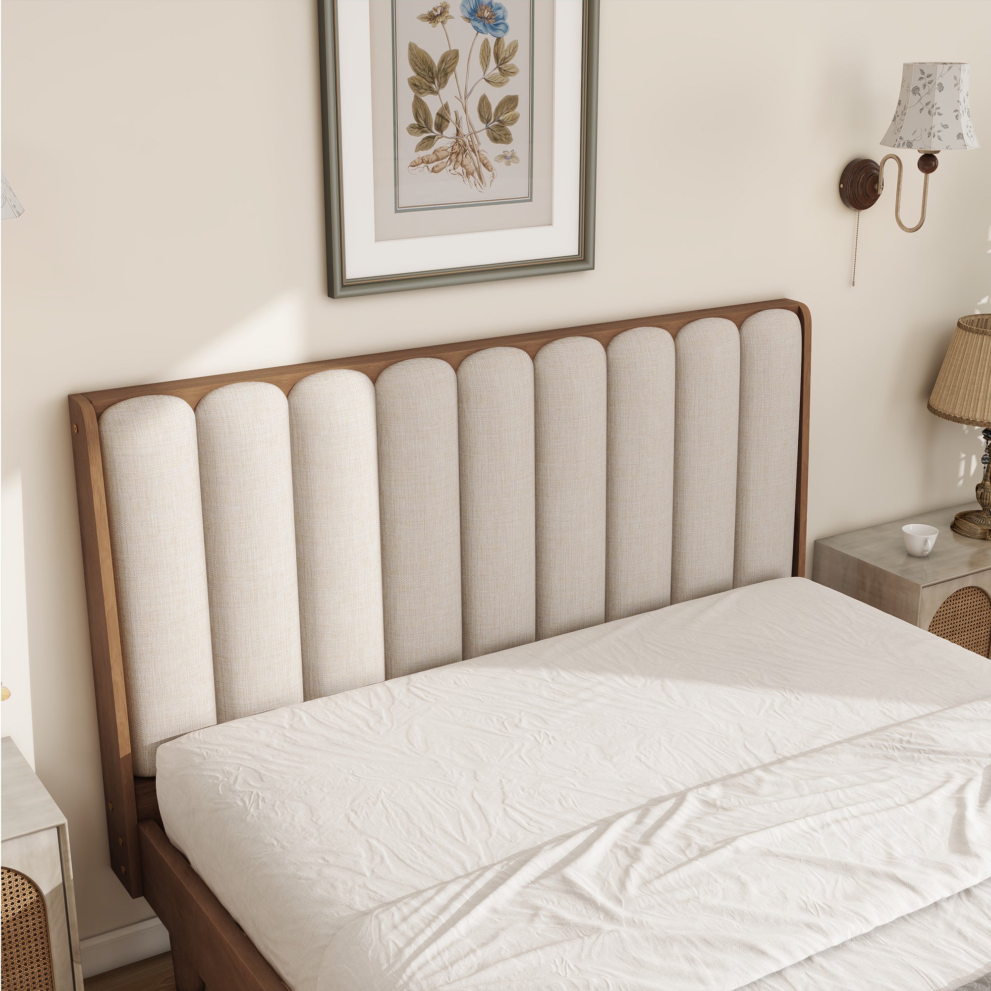 Close-up of the wheat piano-key upholstered headboard, rounded vertical padded columns framed in wood