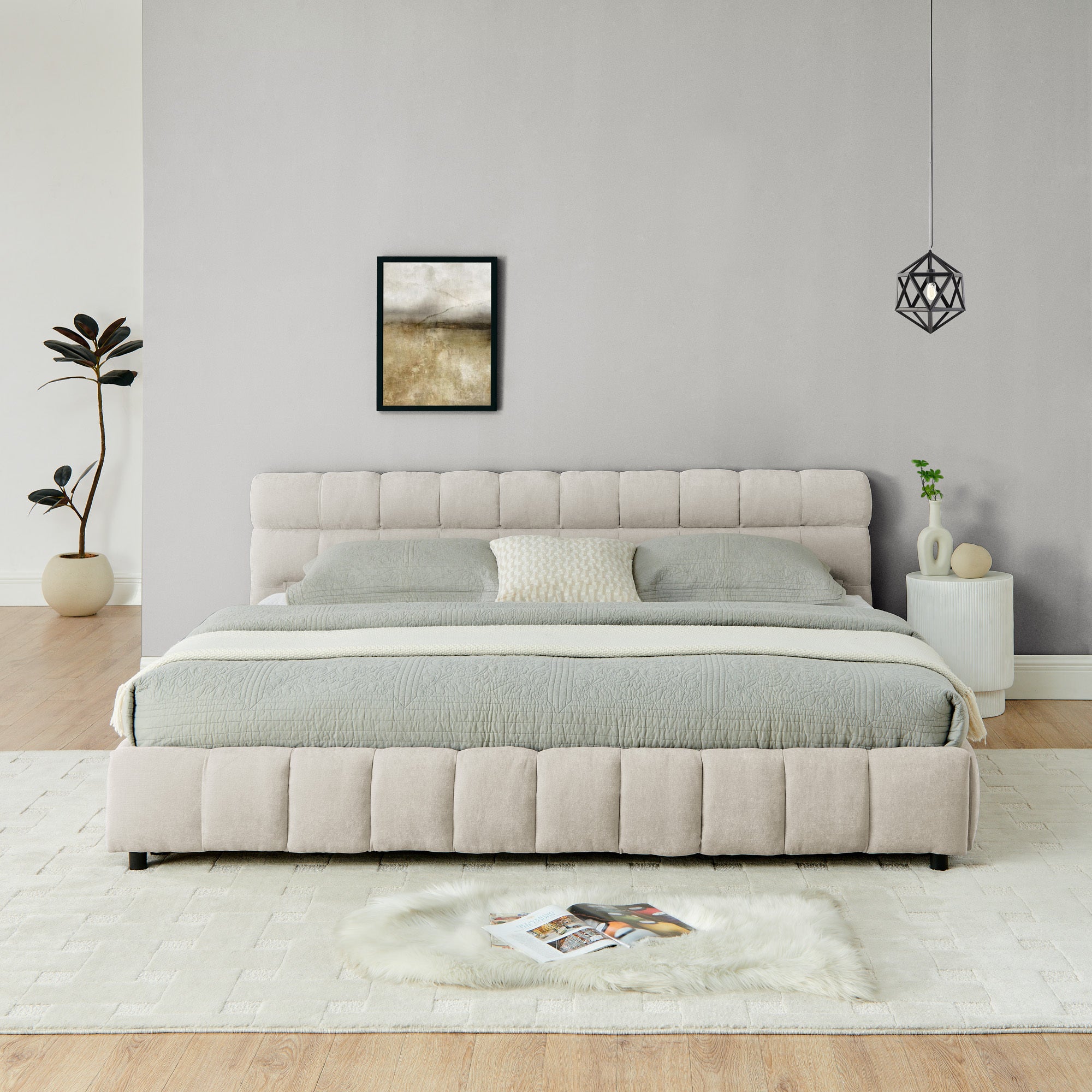 Angled bedroom view of beige chenille king bed with pendant light
