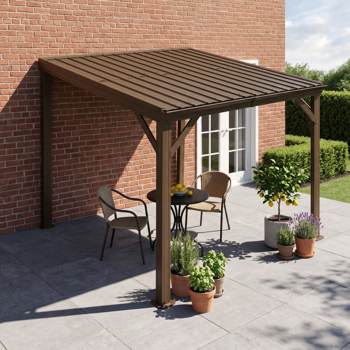 Brown metal 8x8 lean-to hardtop gazebo against a brick wall over a bistro table and two chairs on a stone patio