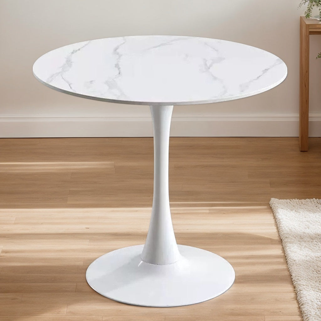 White marble tulip bistro table on wood flooring beside a console, three-quarter view