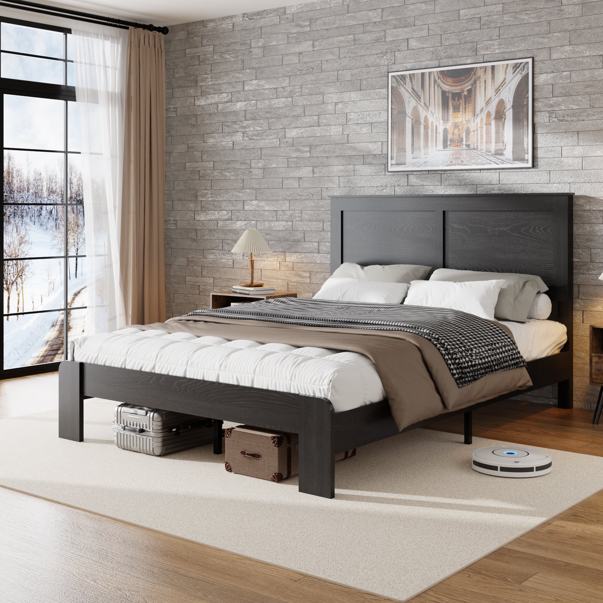 Antique black metal bed frame queen in a bedroom with brick wall and panel headboard, luggage stored under the bed