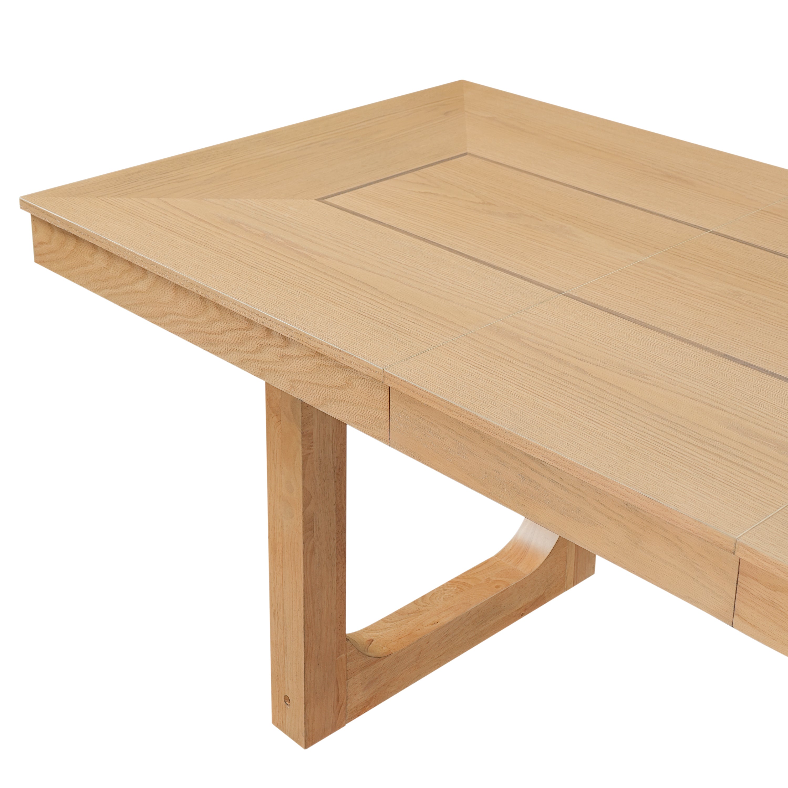 Close-up of the table corner, top edge, and U-shaped leg on a white studio background