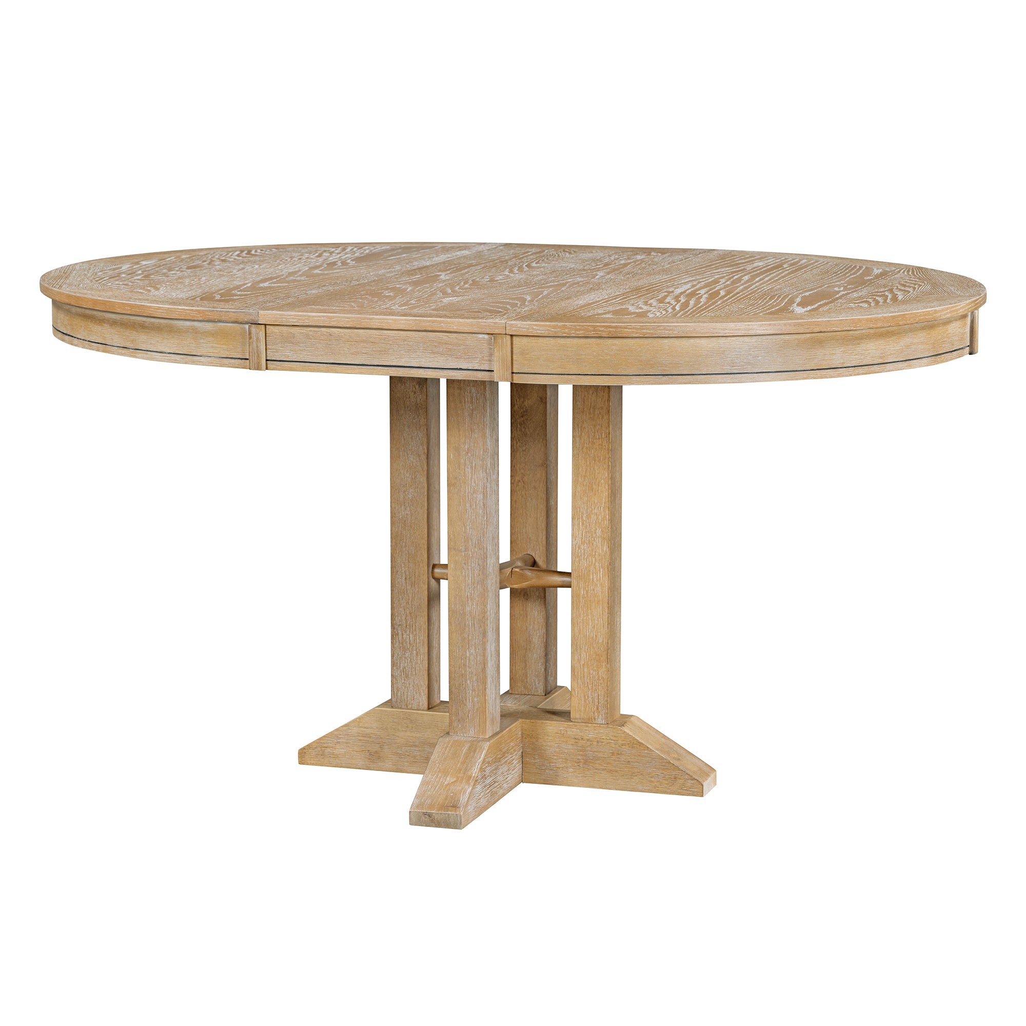 Natural oak round extendable dining table extended to an oval, three-quarter view on white studio background