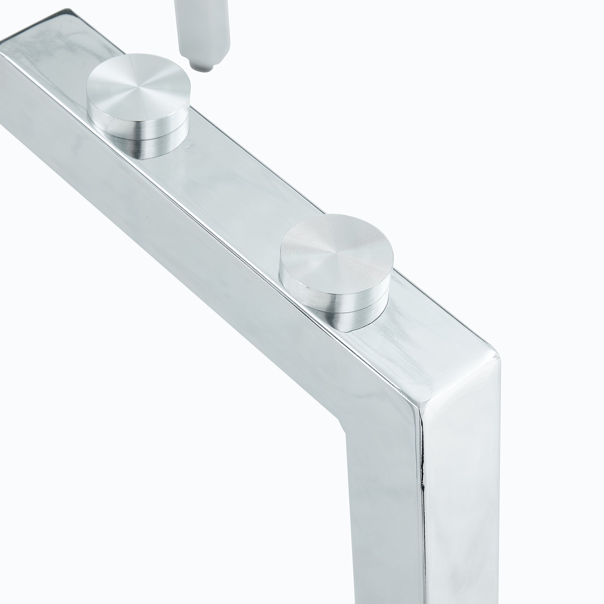 Studio close-up of the chrome corner bracket with two round silver bolt caps