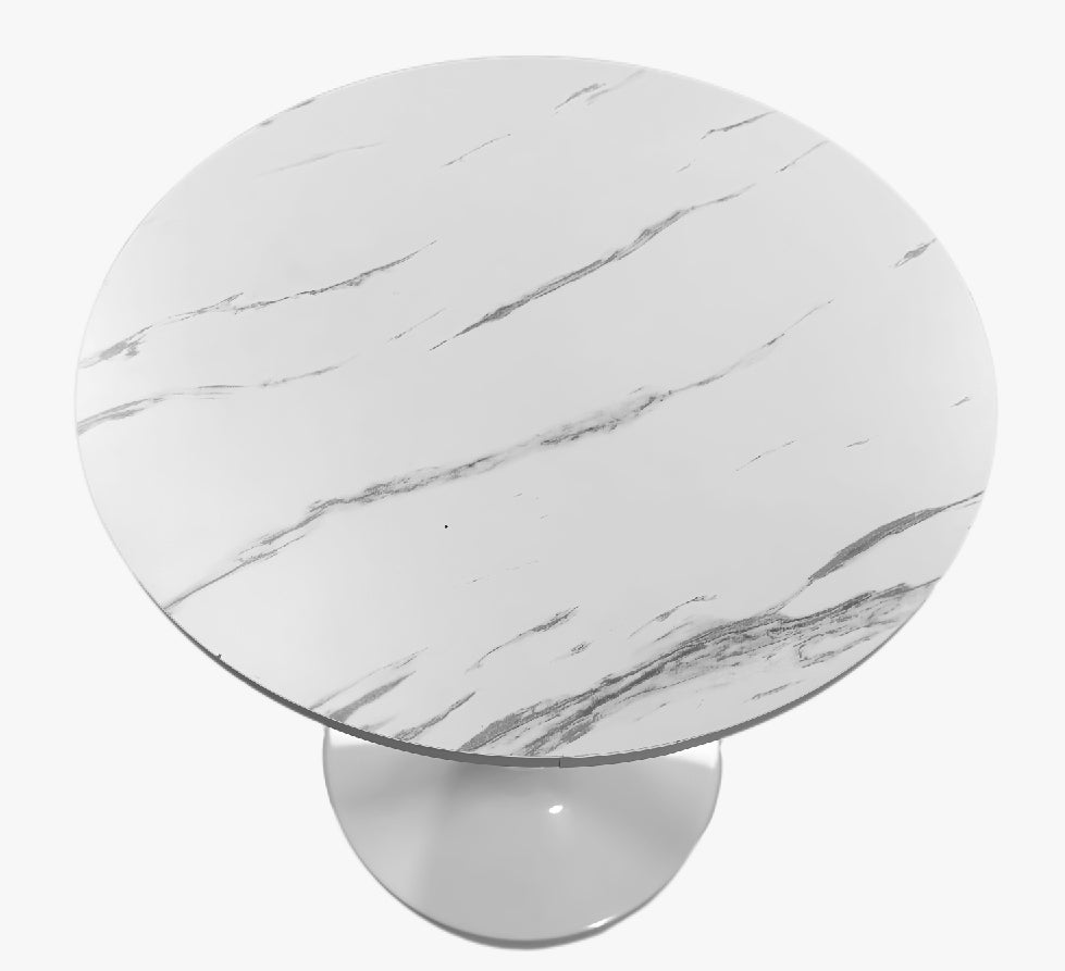 White marble round tabletop and white pedestal base on a plain background, angled overhead view