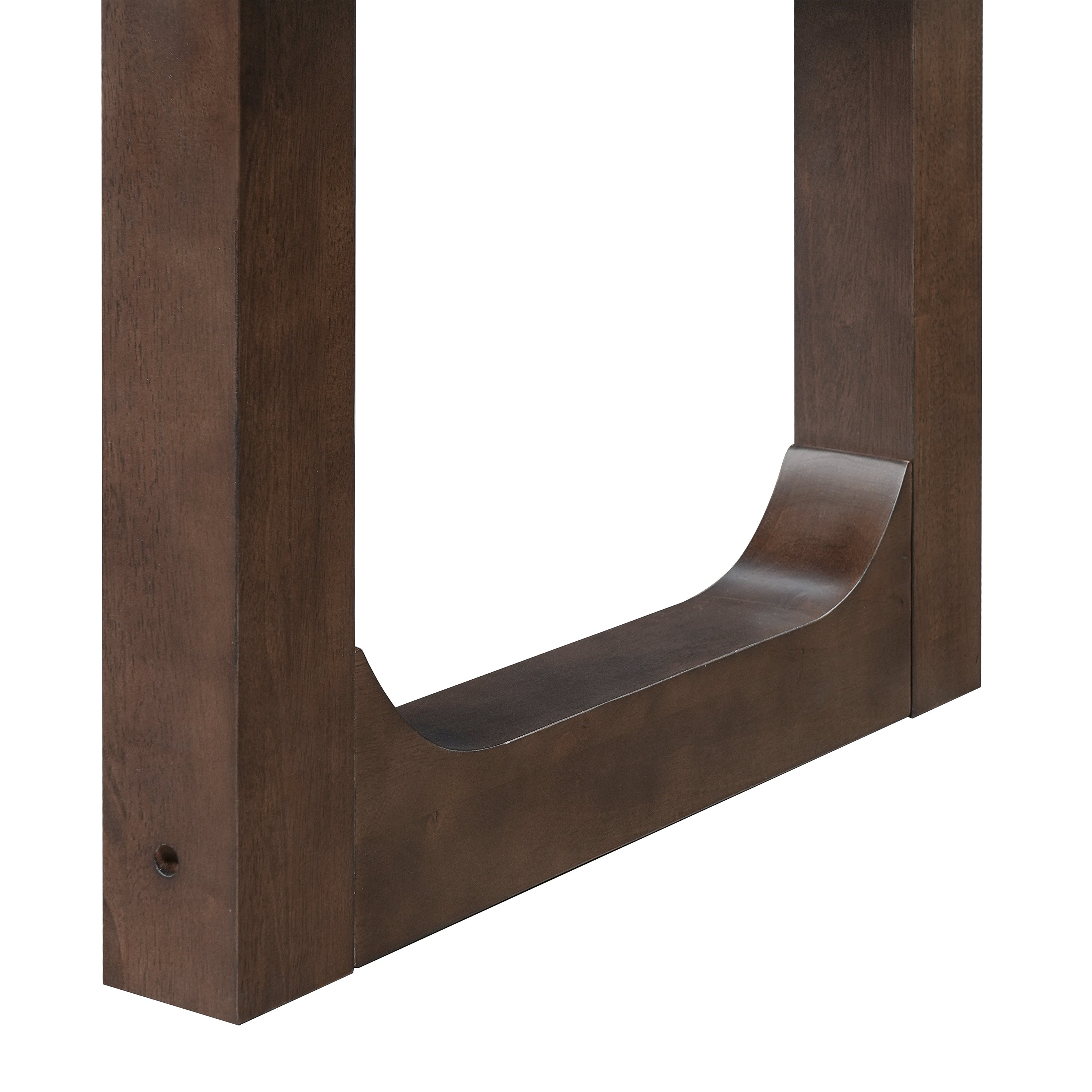 Close-up of the curved U-shaped leg base of the walnut dining table on white background