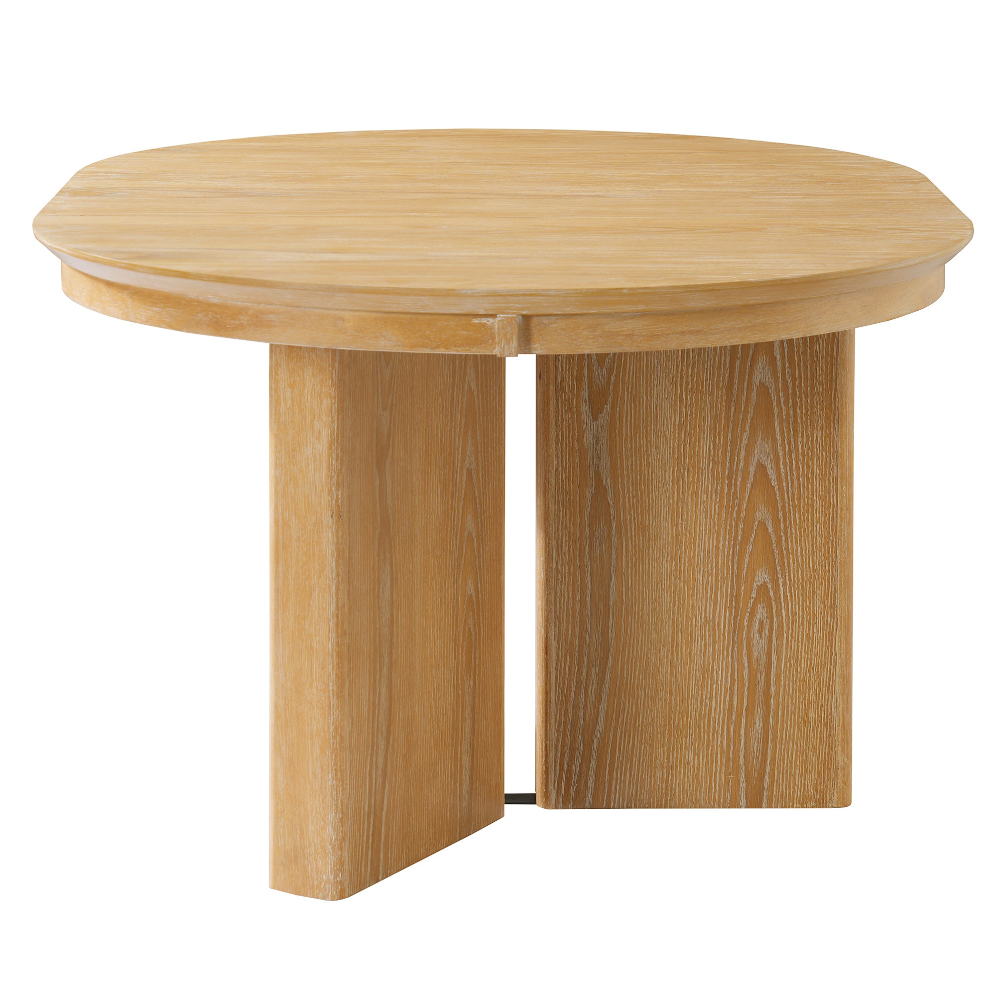 Three-quarter studio view of the closed round natural oak table