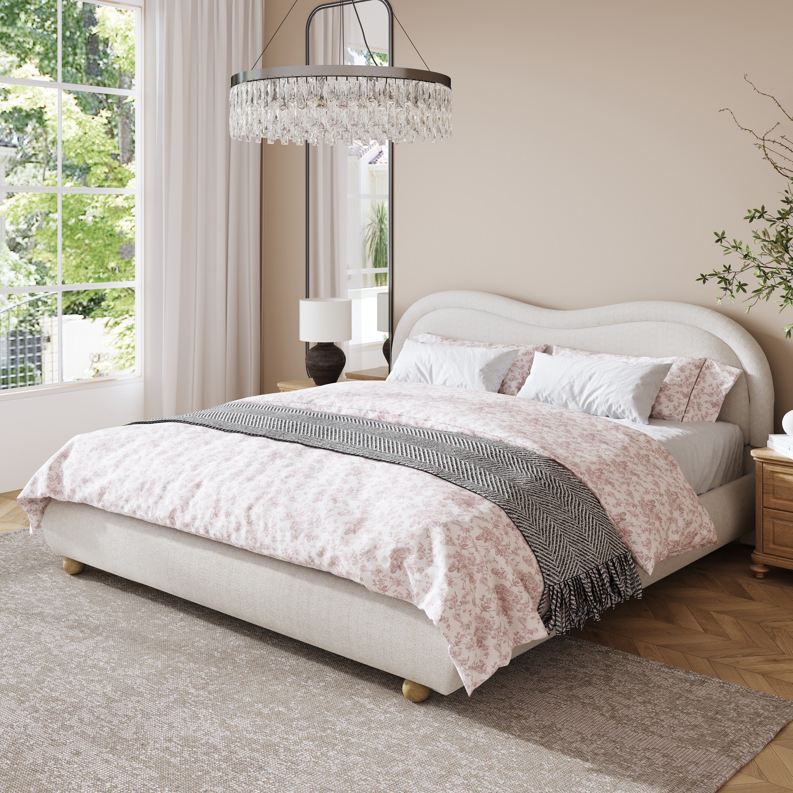Angled beige chenille platform bed with pink floral bedding under a crystal chandelier #Color_Beige