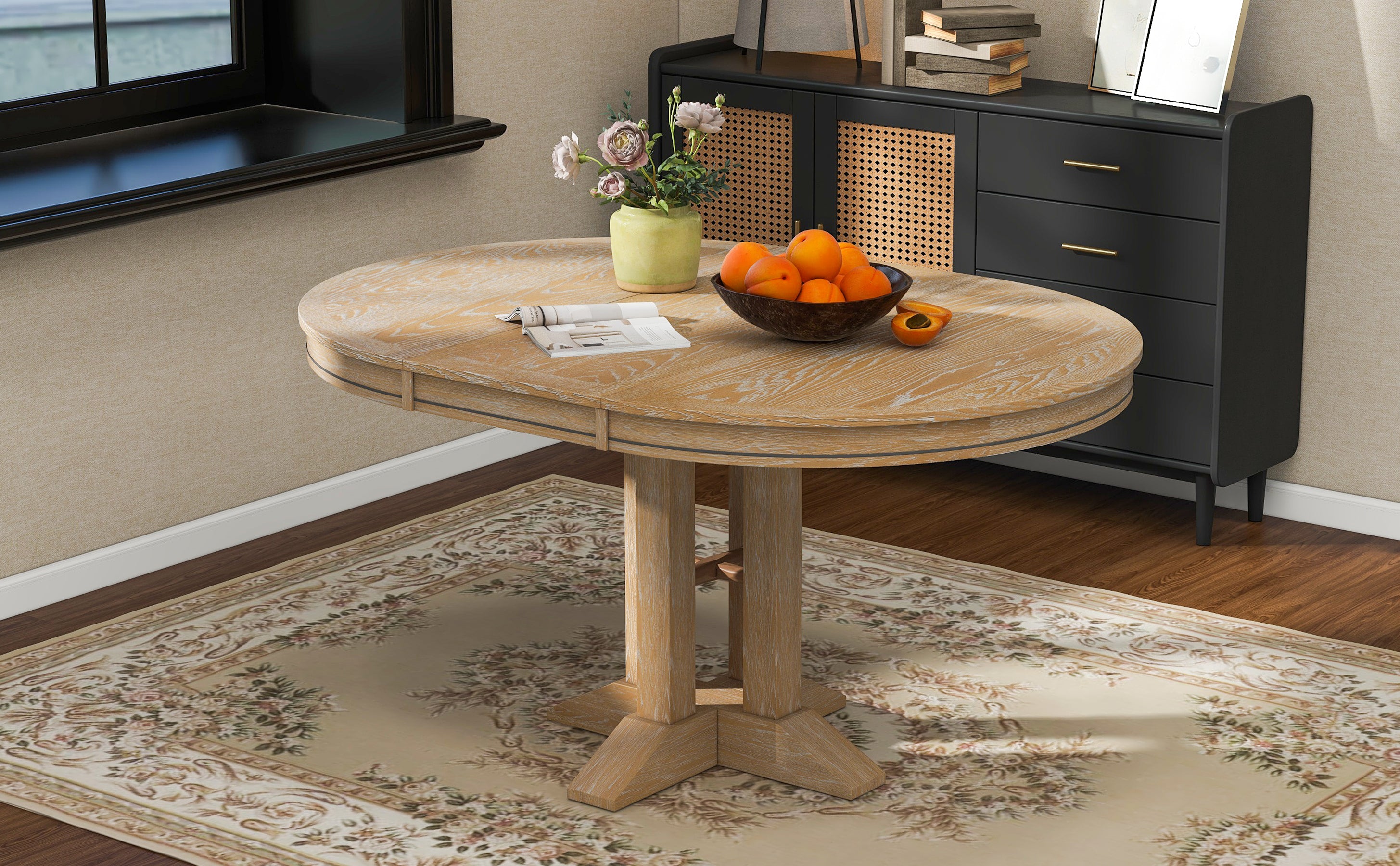 Natural oak round dining table, straight-on view on white studio background