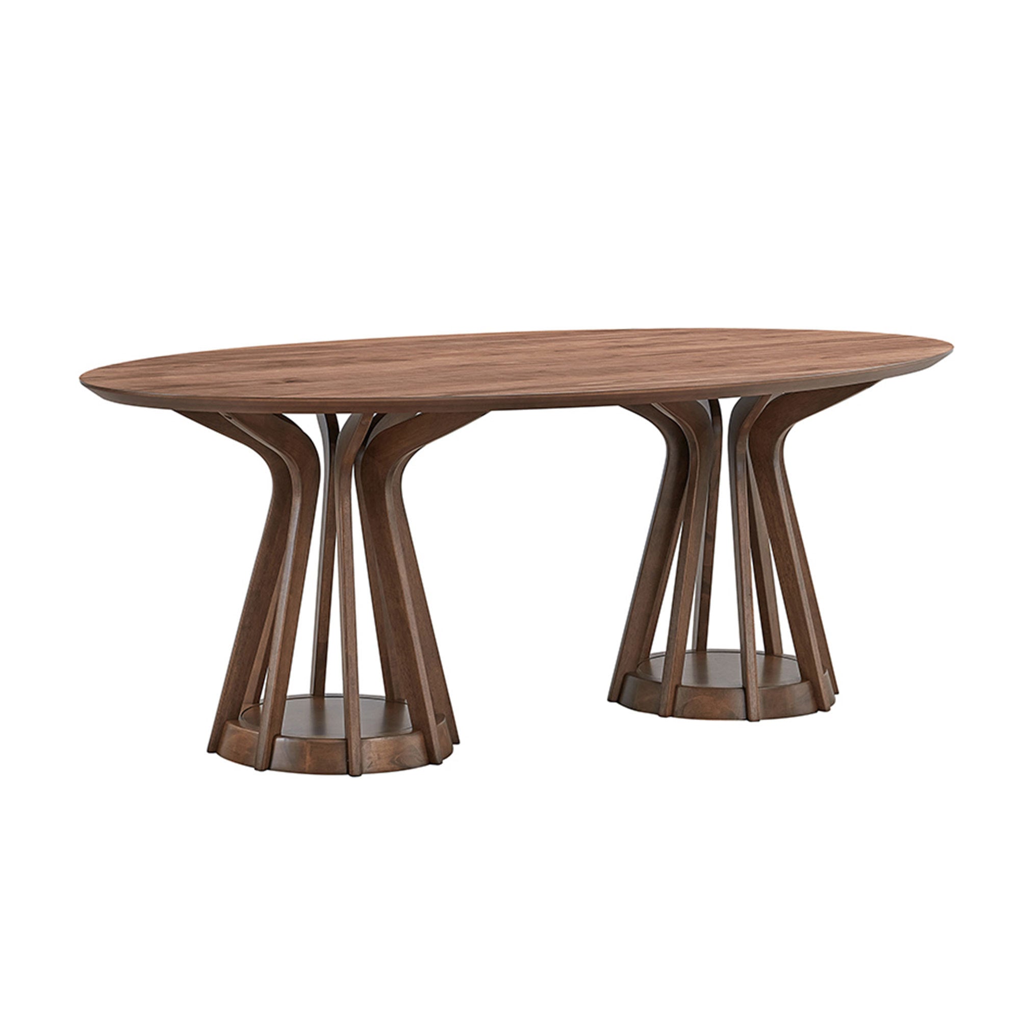 Walnut oval pedestal dining table shown from the side on a plain white studio background