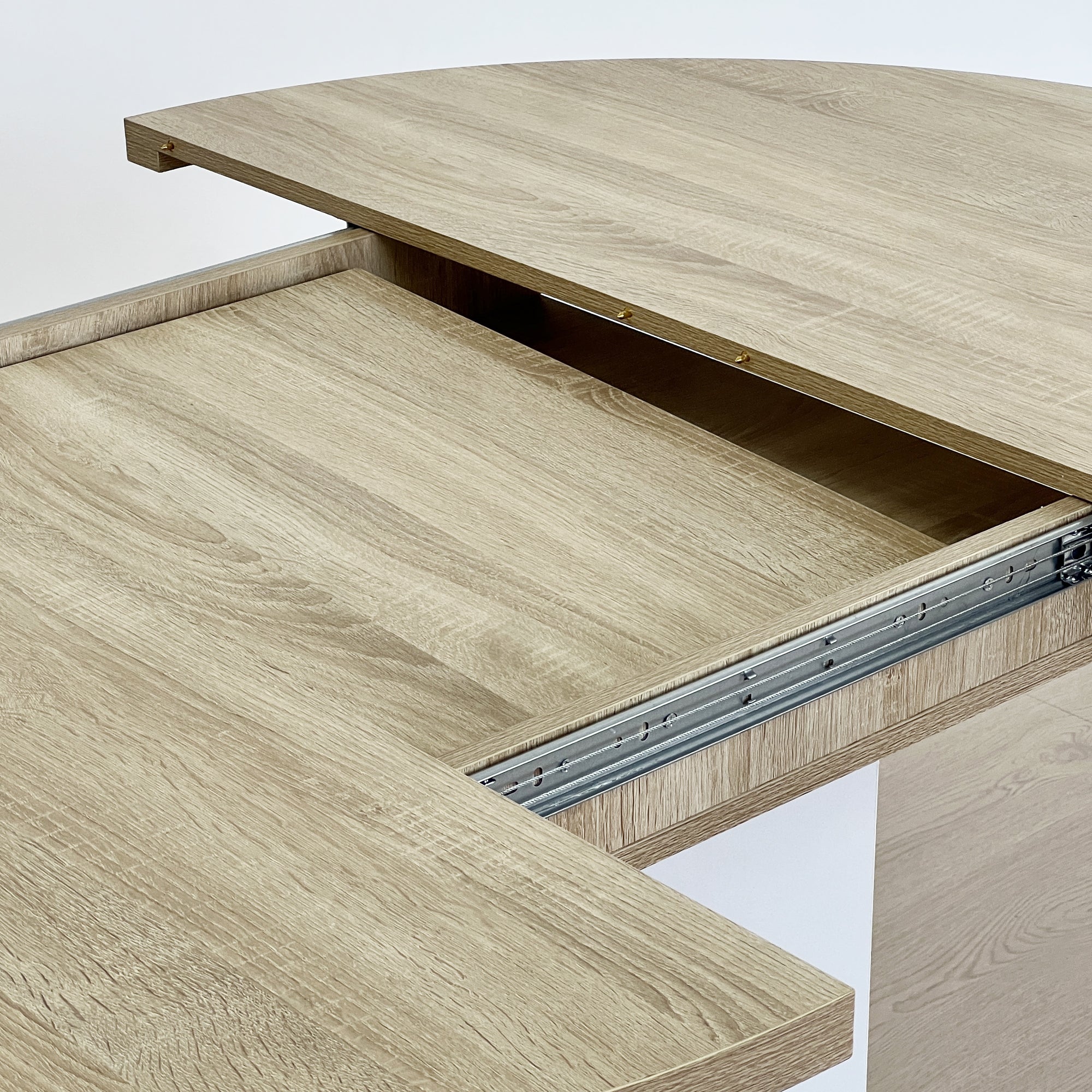 Close-up of the oak top pulled apart showing the extension cavity and slide rail