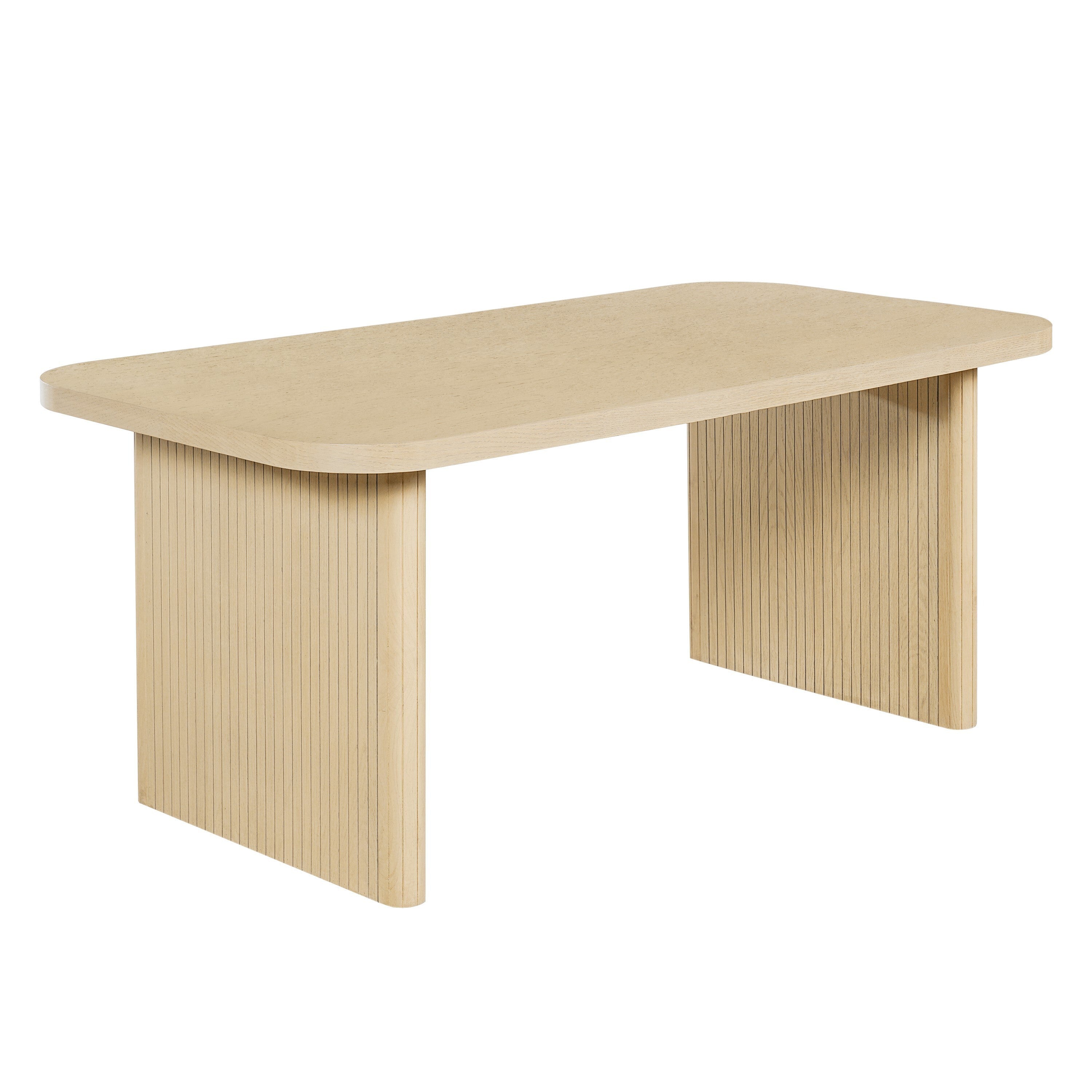 Three-quarter view of the natural oak ribbed-leg dining table on a white studio background
