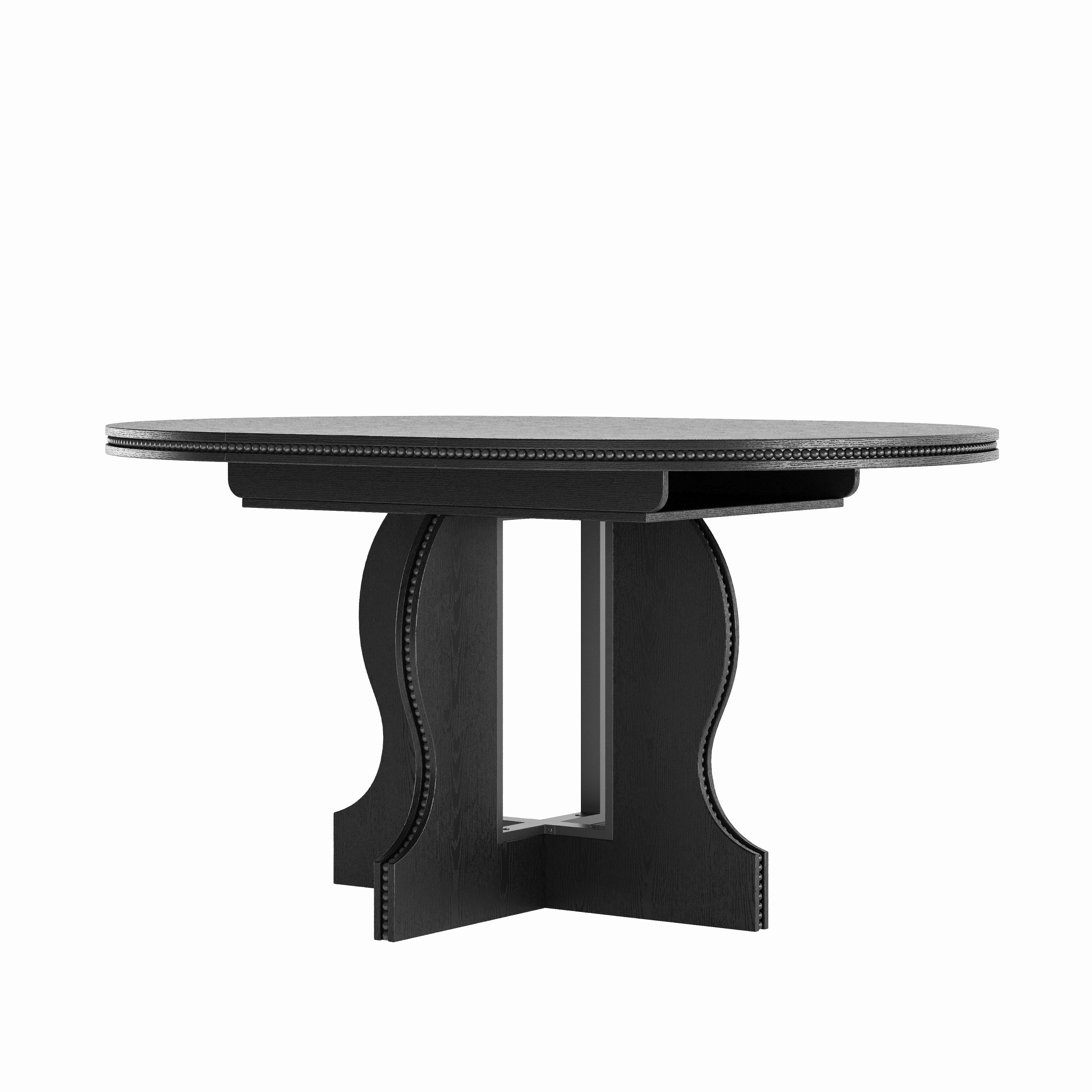 Black round pedestal dining table, three-quarter view from another angle on a plain white background