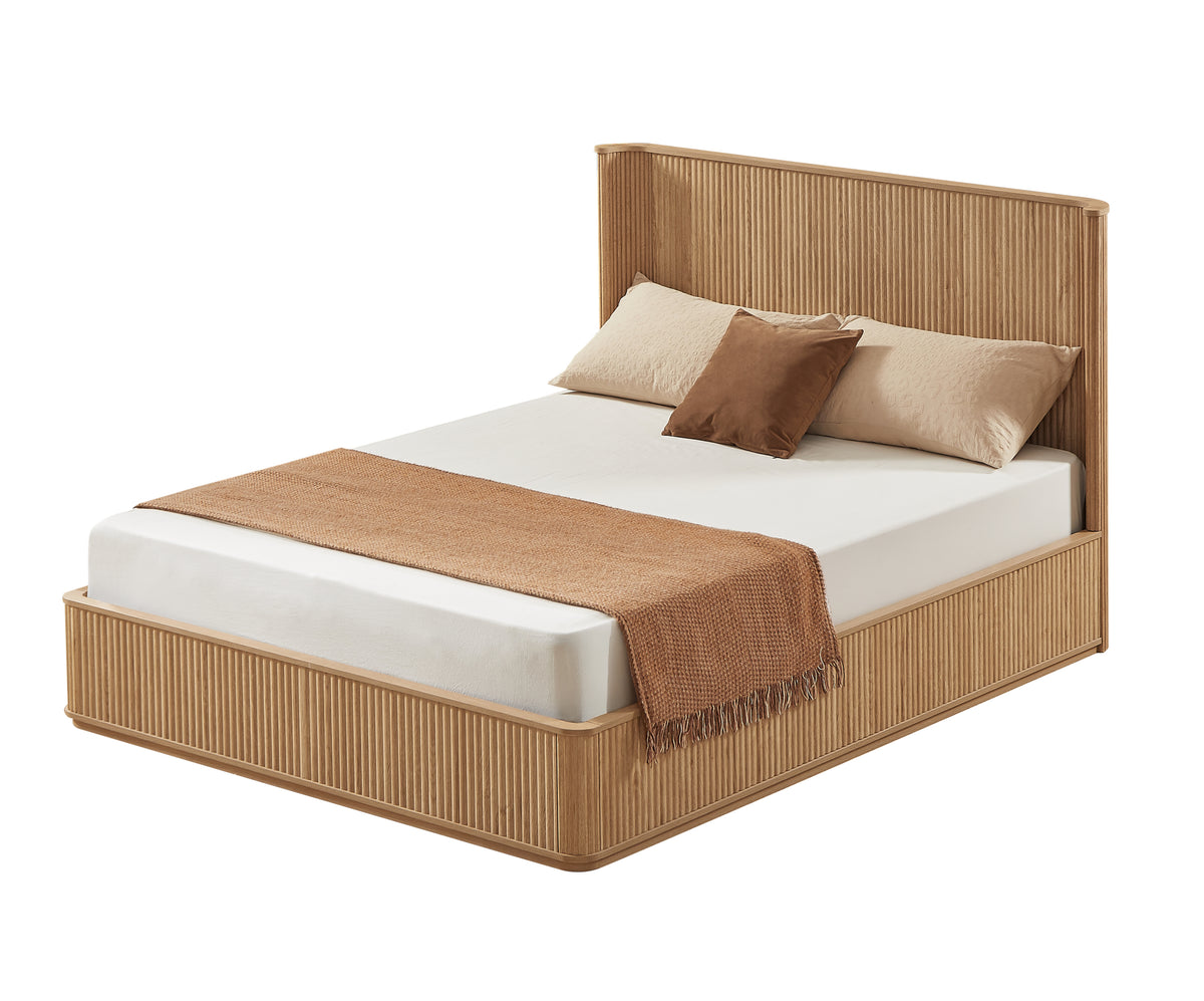 Studio angle of the natural oak fluted queen platform bed with styled bedding on white