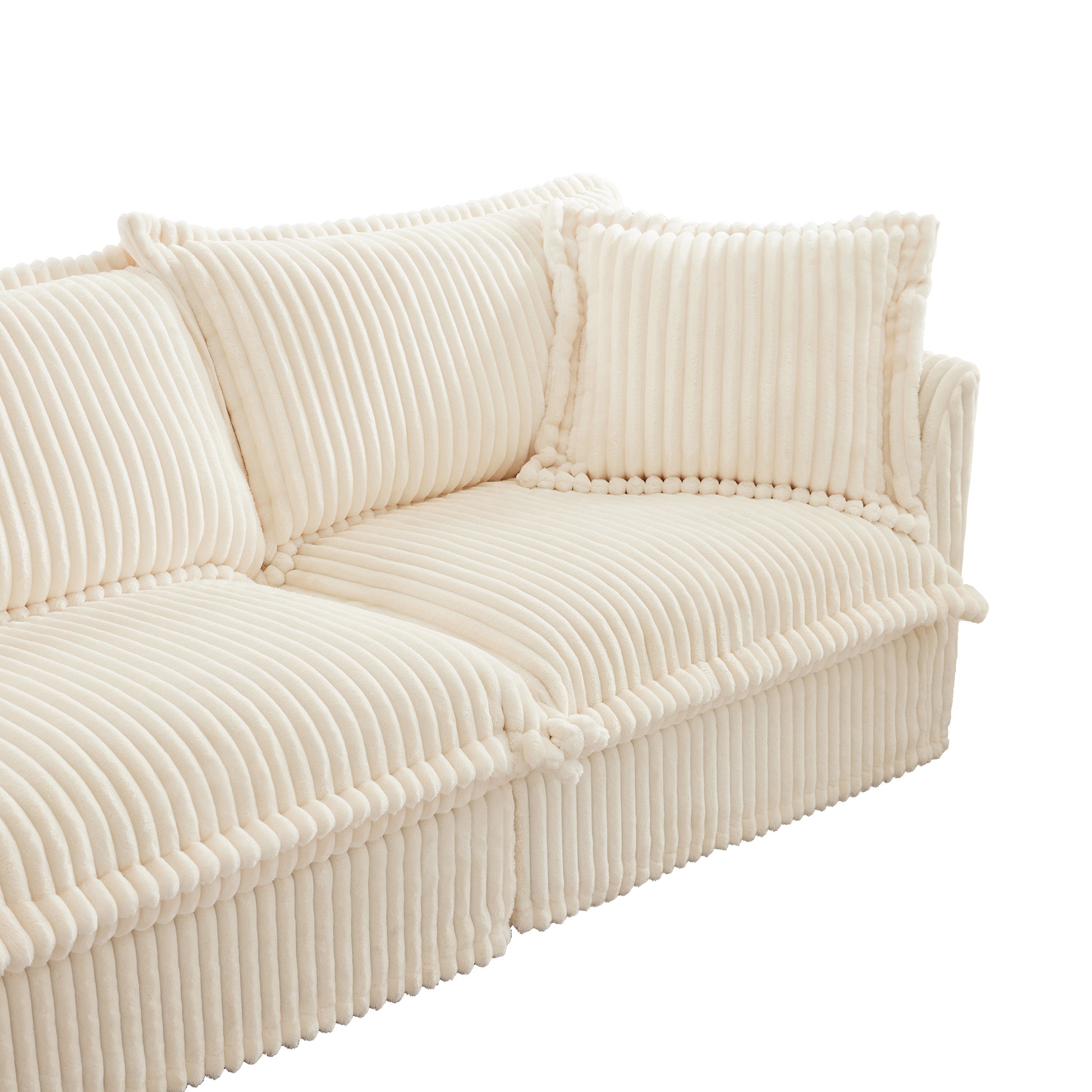 Side view of a cream corduroy couch highlighting the fluffy, ribbed texture of the fabric and clean stitching details. Features plush cushions with removable, washable covers.