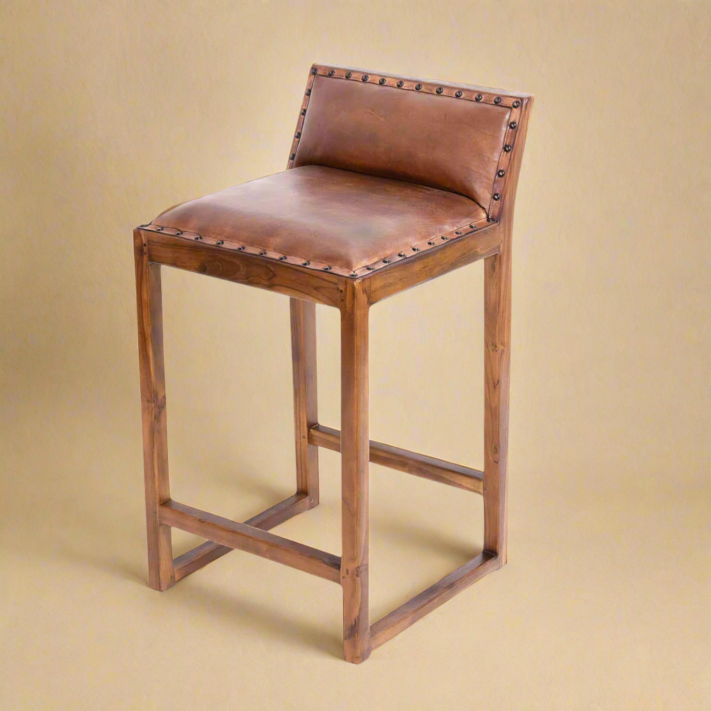 Genuine leather counter stool with studs and solid wood from a quarter angle