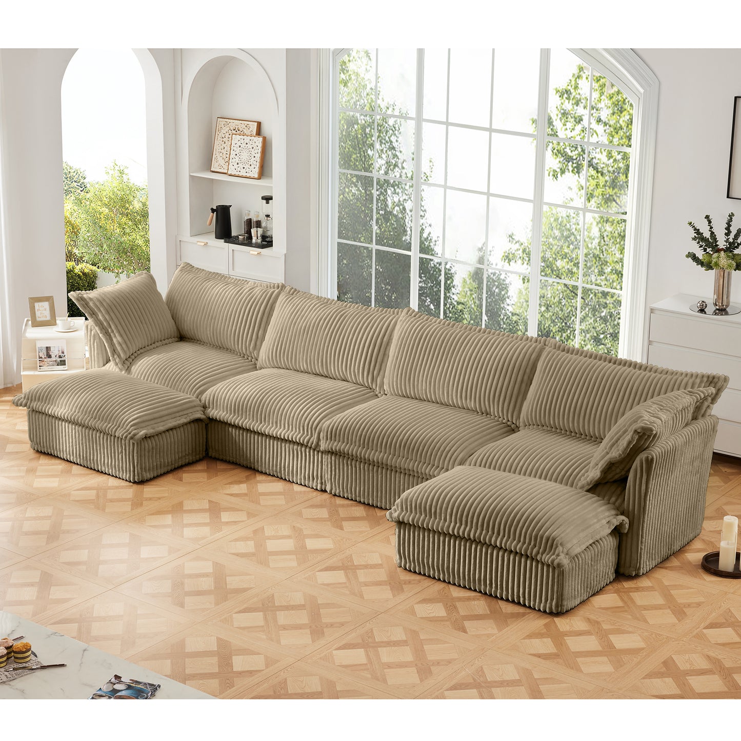 Styled living room featuring a fluffy camel corduroy modular sectional with two ottomans, showcasing deep plush cushions, cozy wide-wale fabric, and a relaxed, inviting layout.