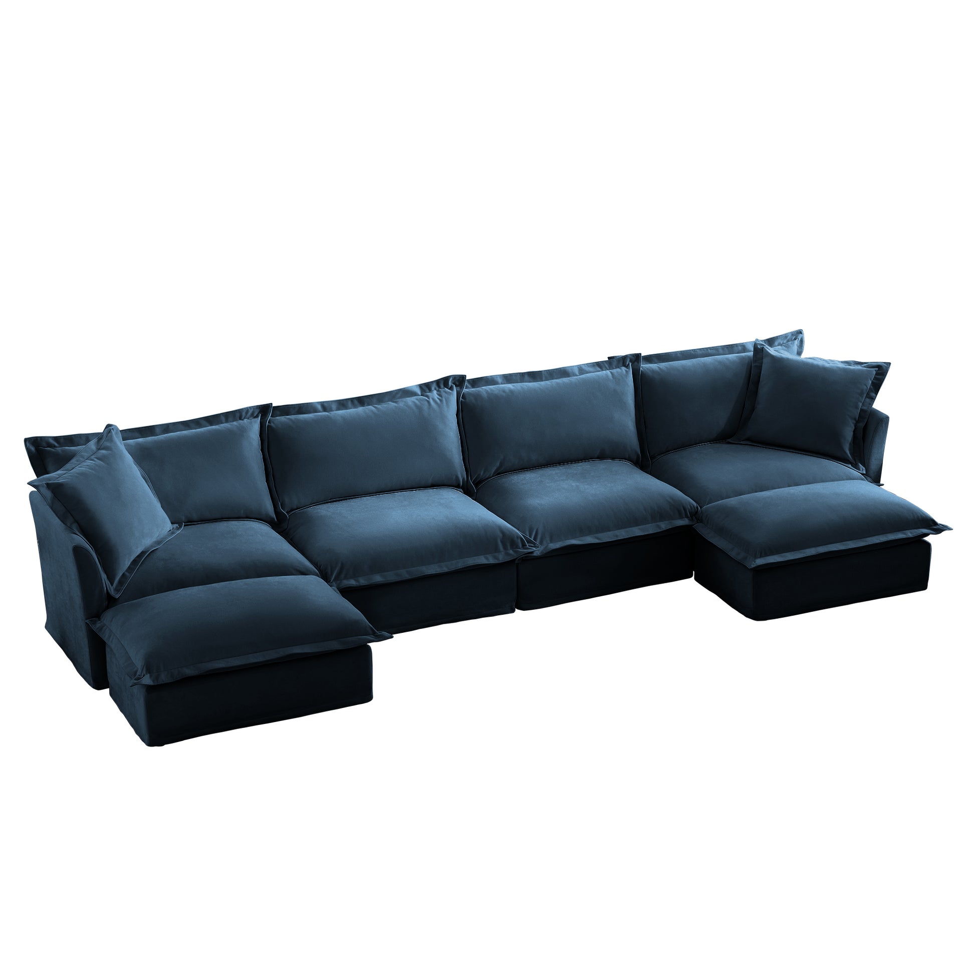 Studio shot of a navy chenille modular sectional angled to show depth and dimension, with two ottomans and fluffy cushions, emphasizing its cozy design and removable slipcovers.