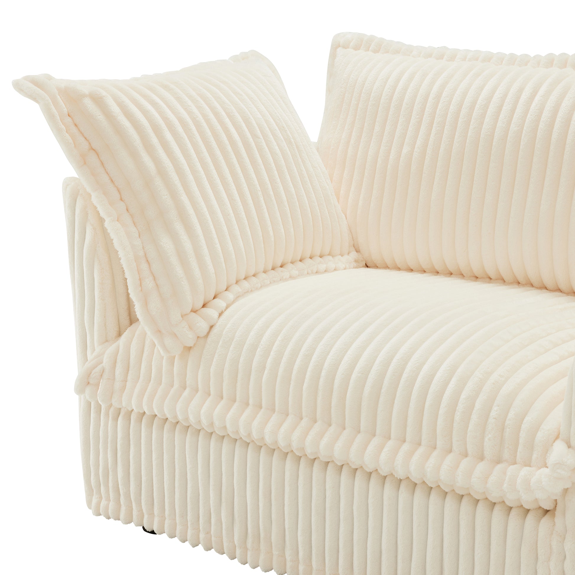 Close-up of the side cushion and matching pillow on a cream corduroy couch, showcasing the soft, fluffy texture and removable, washable cover for easy care.
