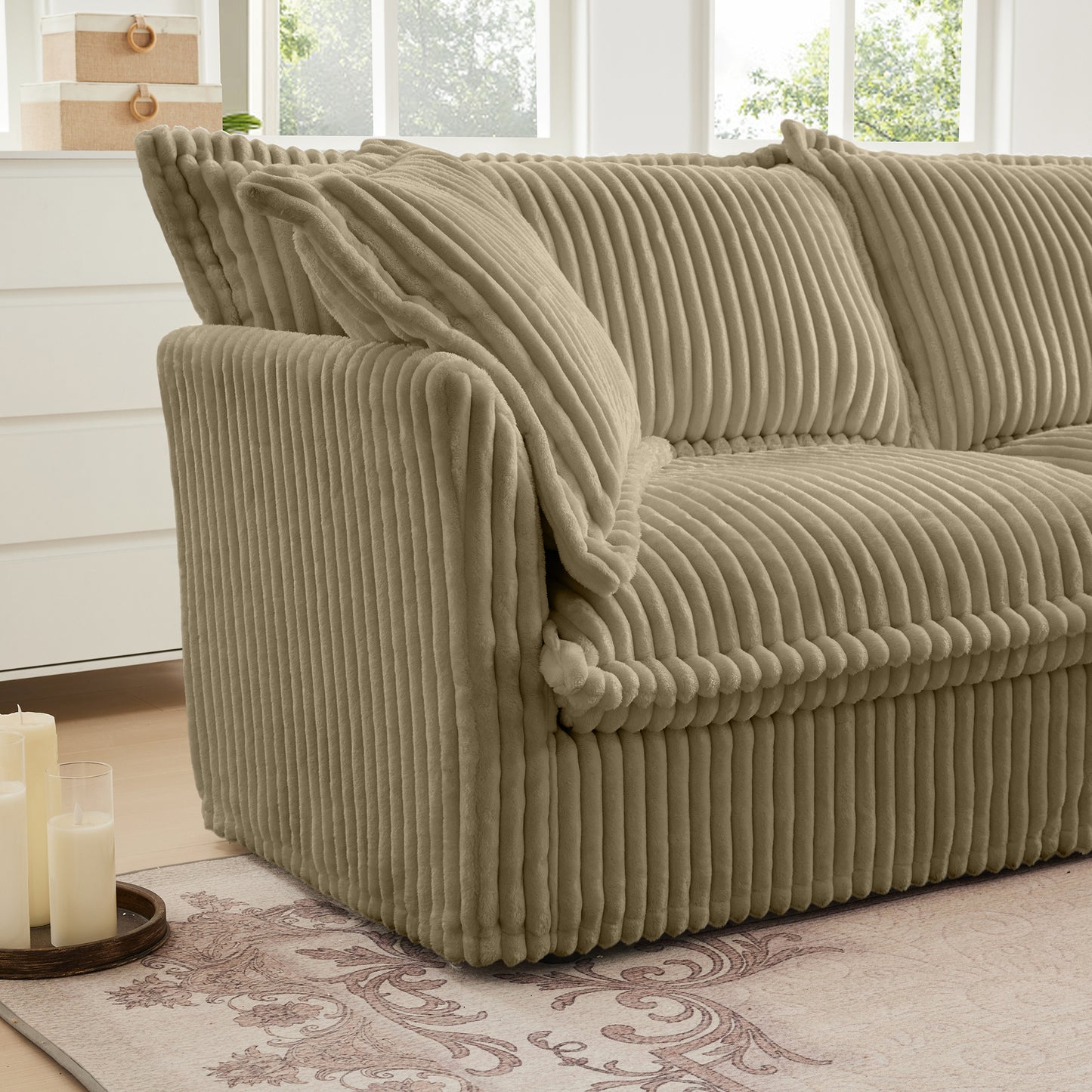 Side view of the fluffy camel corduroy sectional showcasing the plush armrest, thick seat cushion, and soft, textured wide-wale fabric for a cozy and stylish finish.