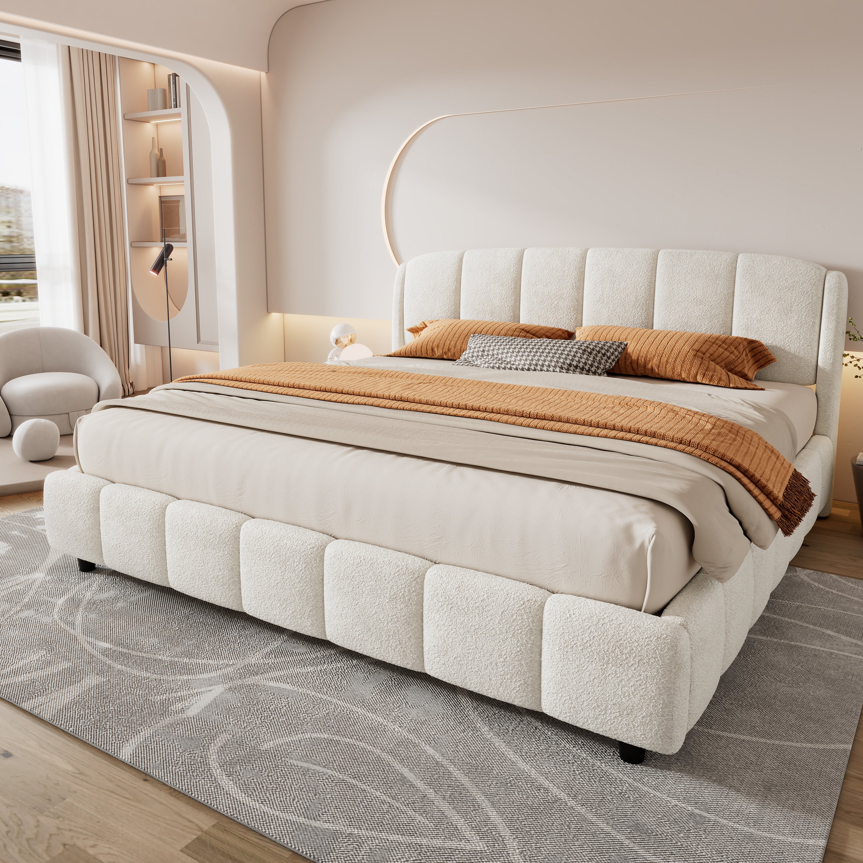 Beige bouclé king platform bed styled with orange and patterned pillows