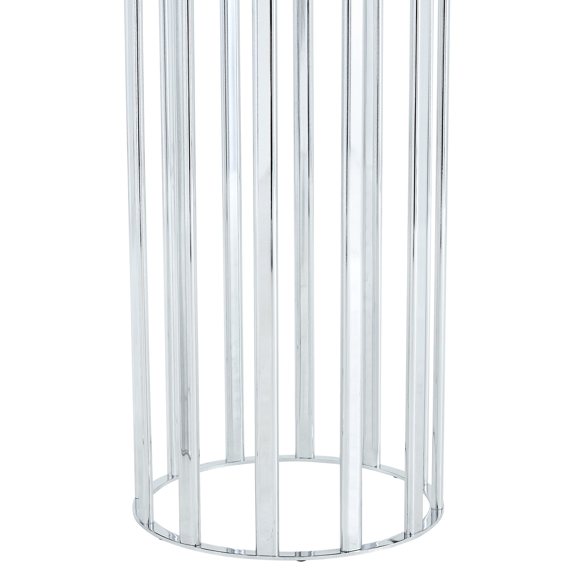 Studio close-up of the silver column pedestal base of the oval glass dining table.