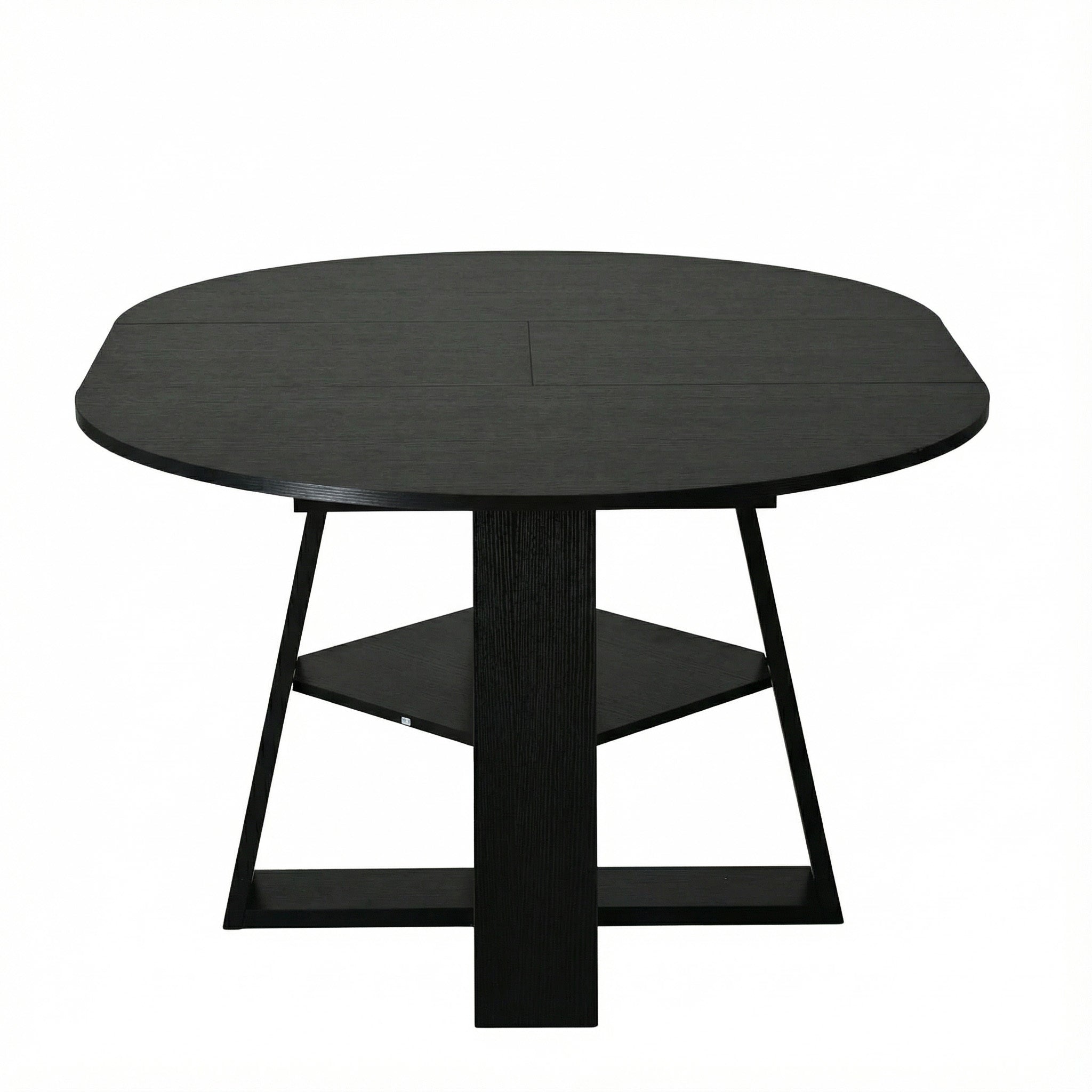 Angled studio view of the black table extended to an oval on a white background