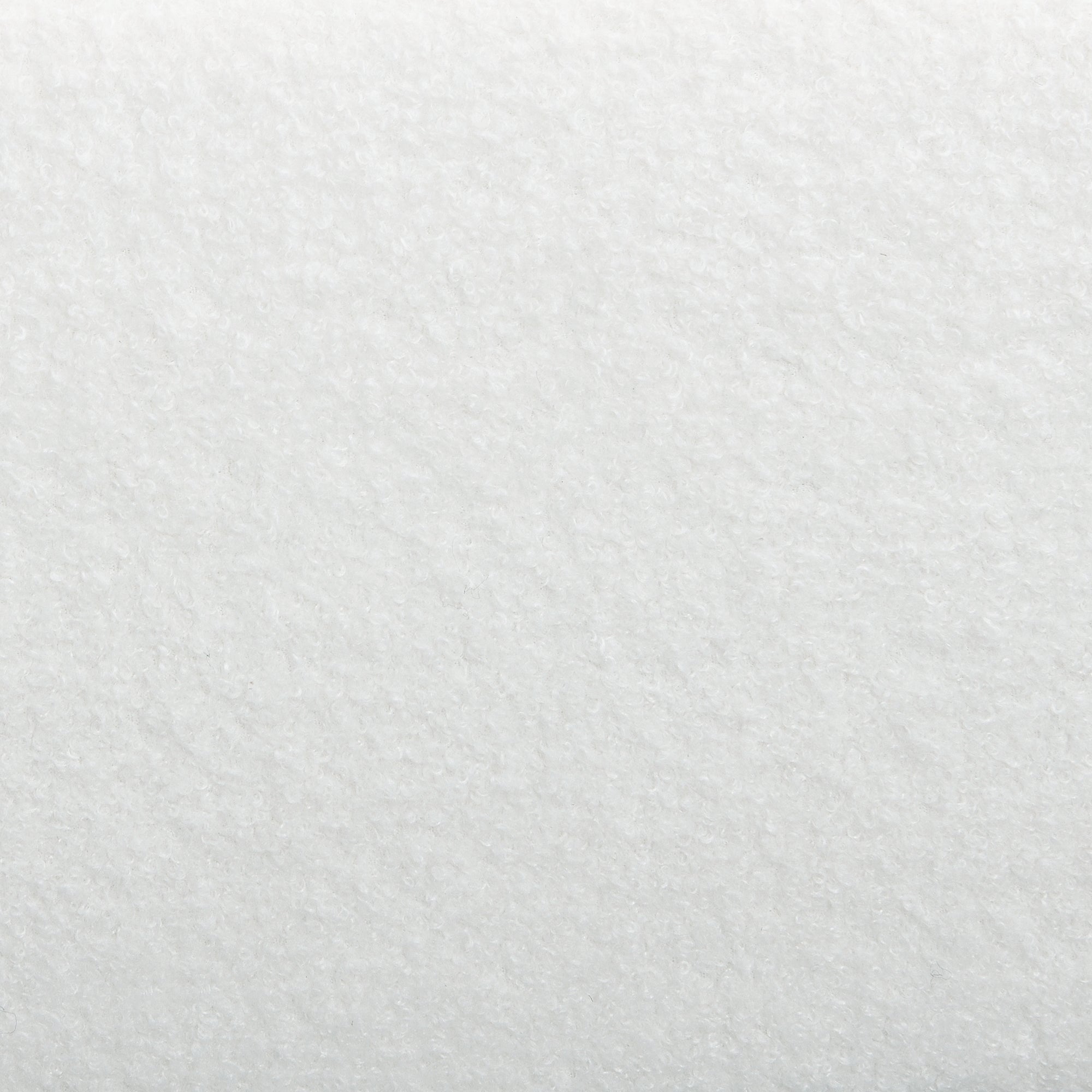 Close-up of white bouclé fabric texture on king bed frame
