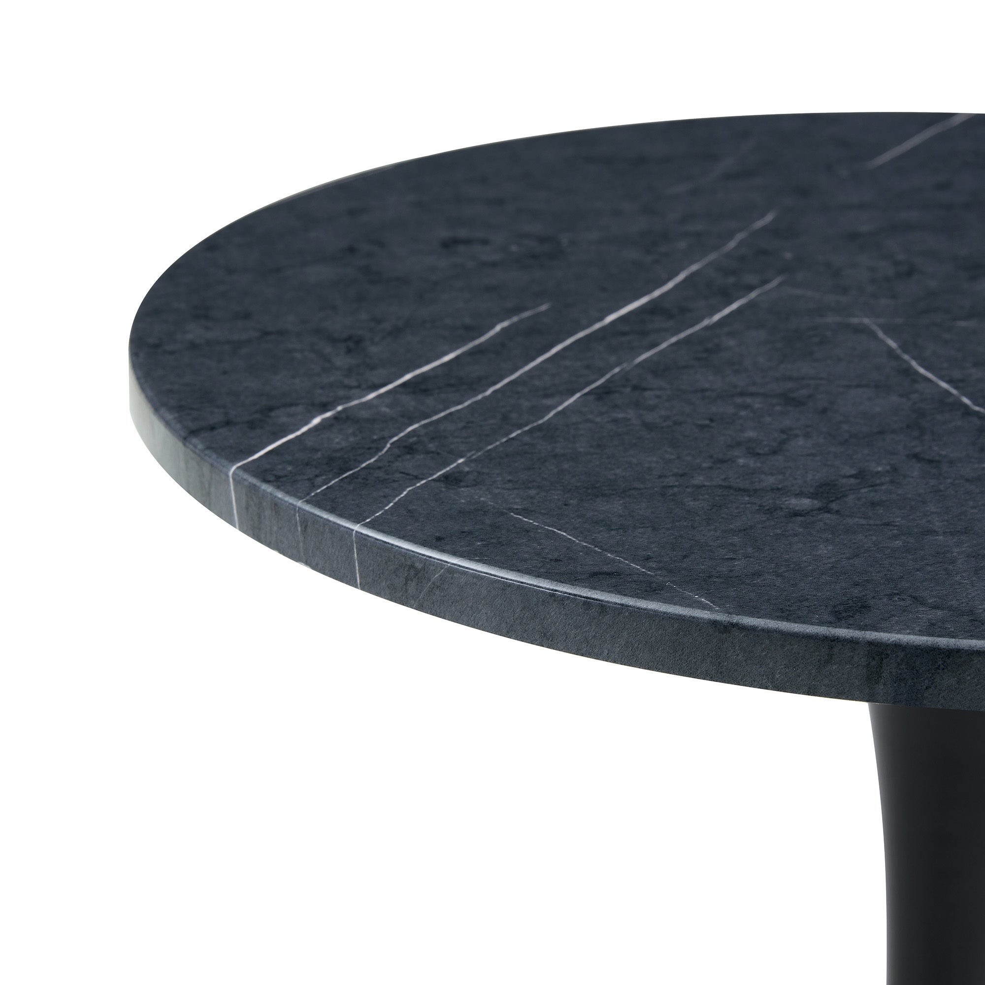 Close-up of the black faux marble tabletop edge showing the veined finish