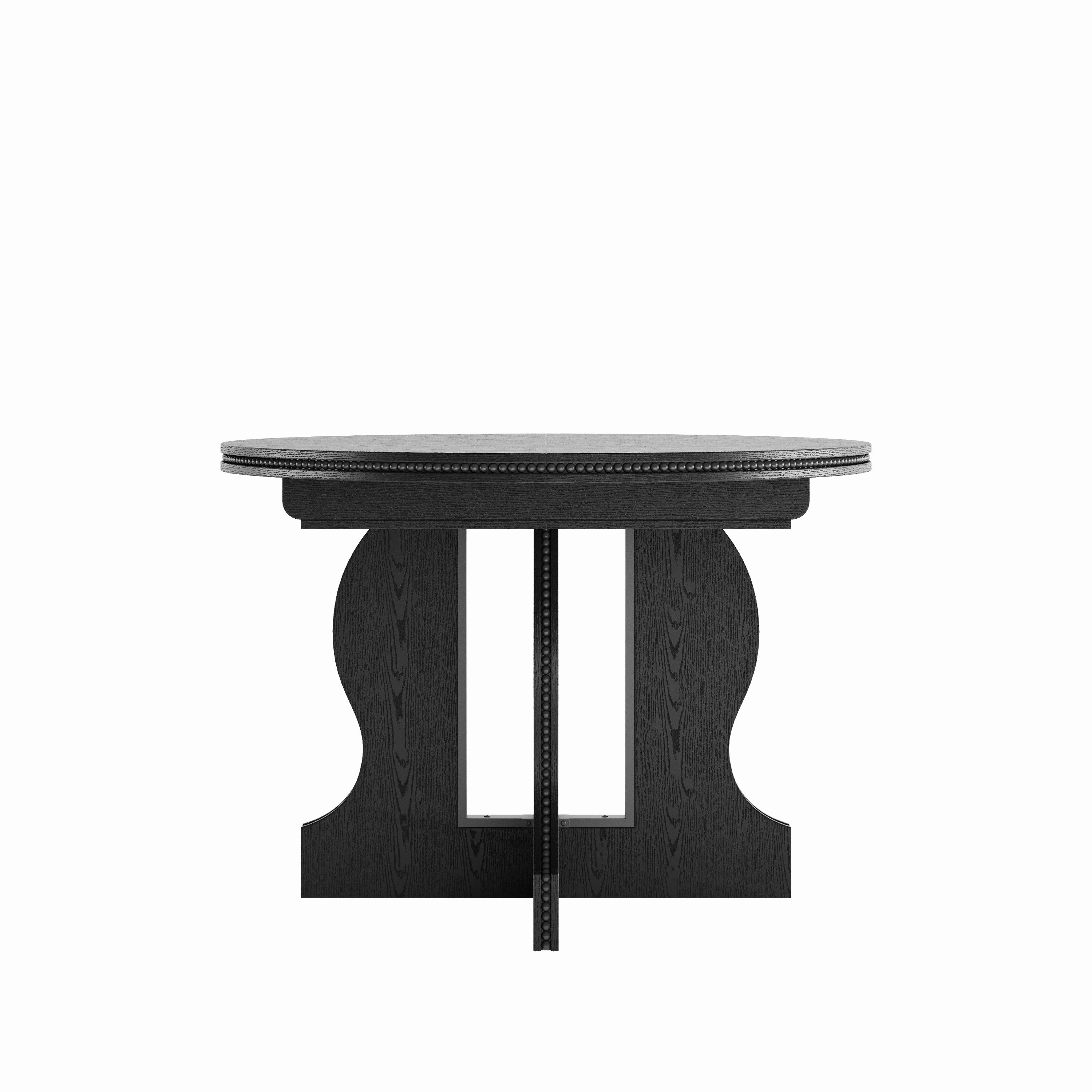 Black round pedestal dining table, straight-on front view on a plain white studio background