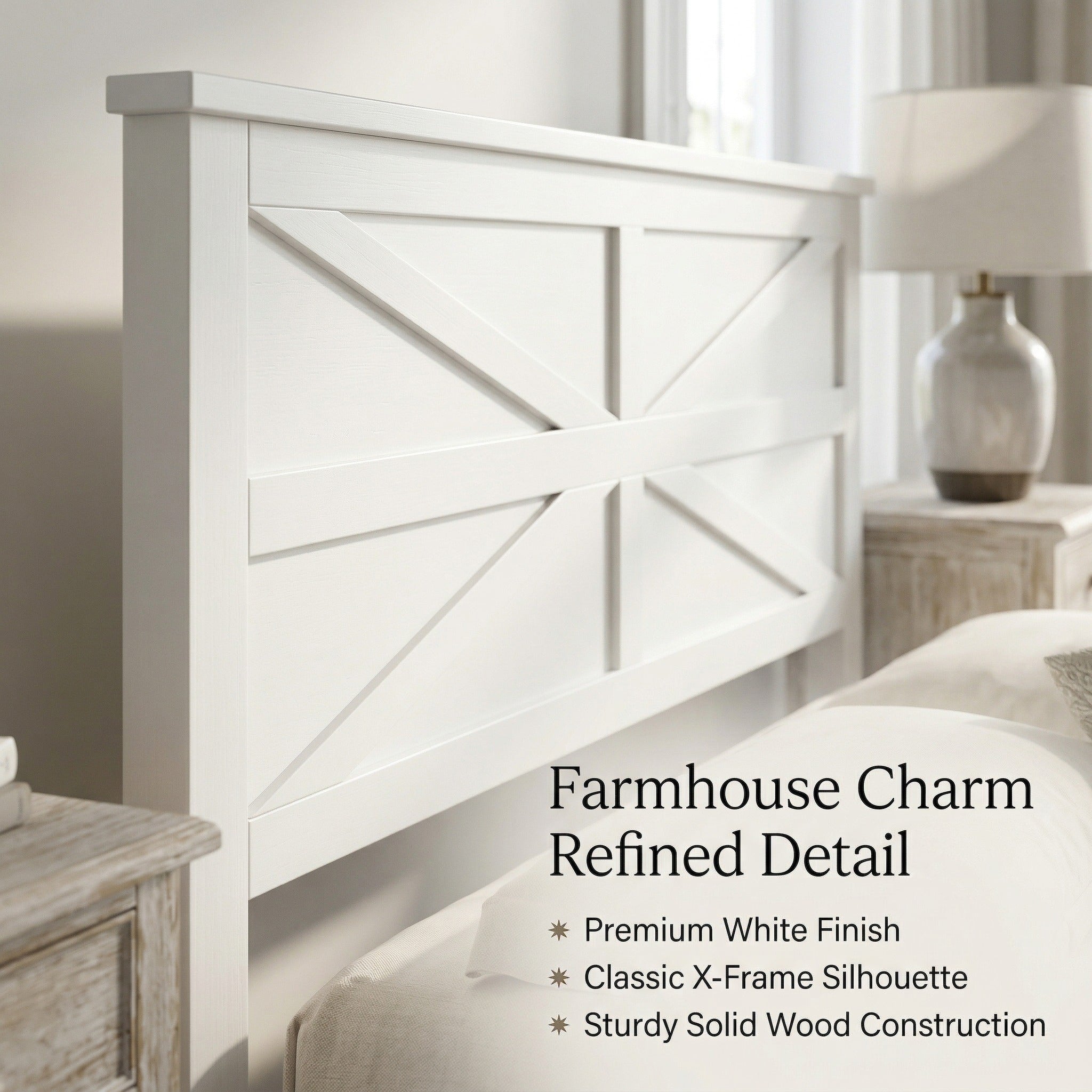 Close-up of the white headboard barn-door detail showing the classic X-frame bracing and clean white finish