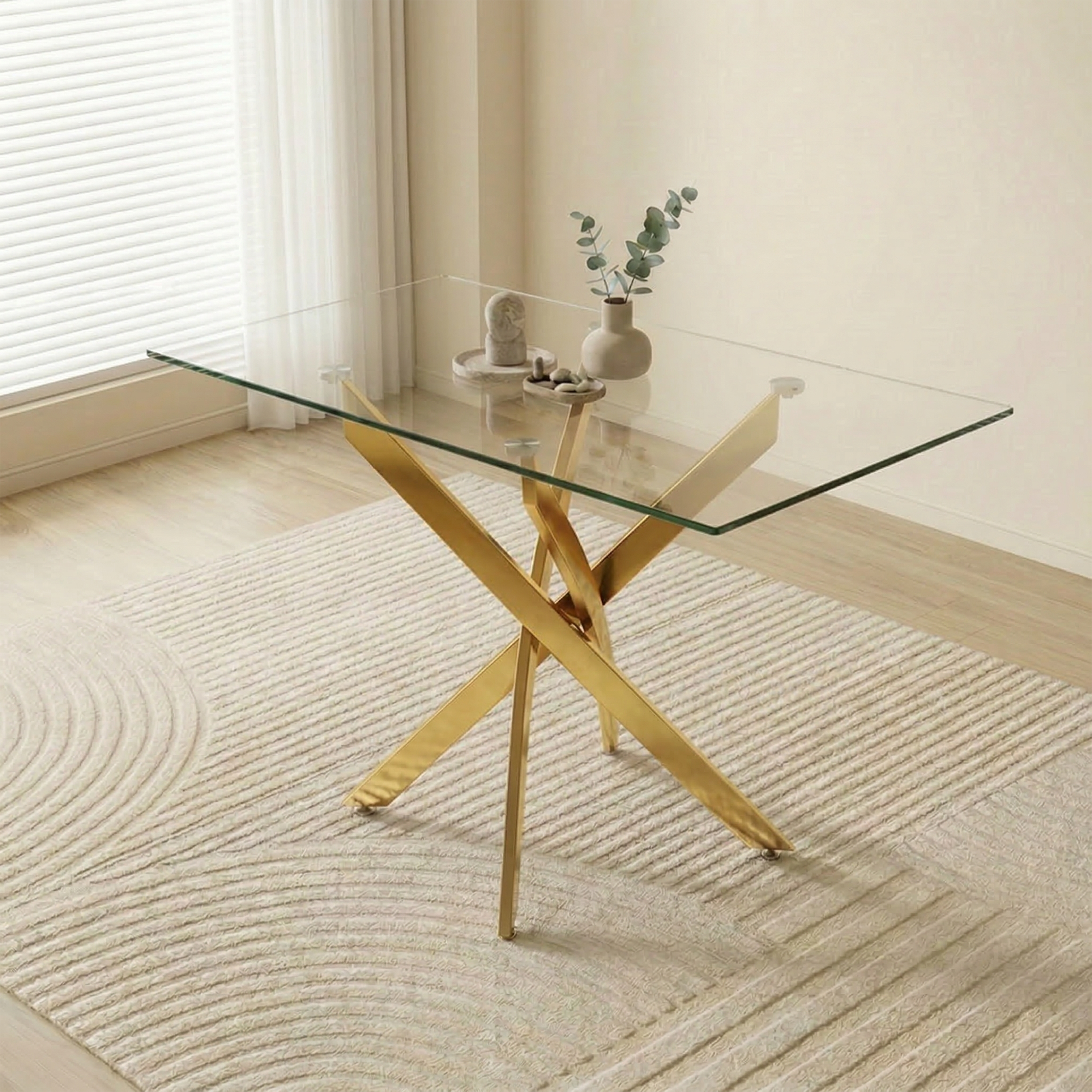 Styled room scene with the gold-leg glass table, vase and books by arched shelving