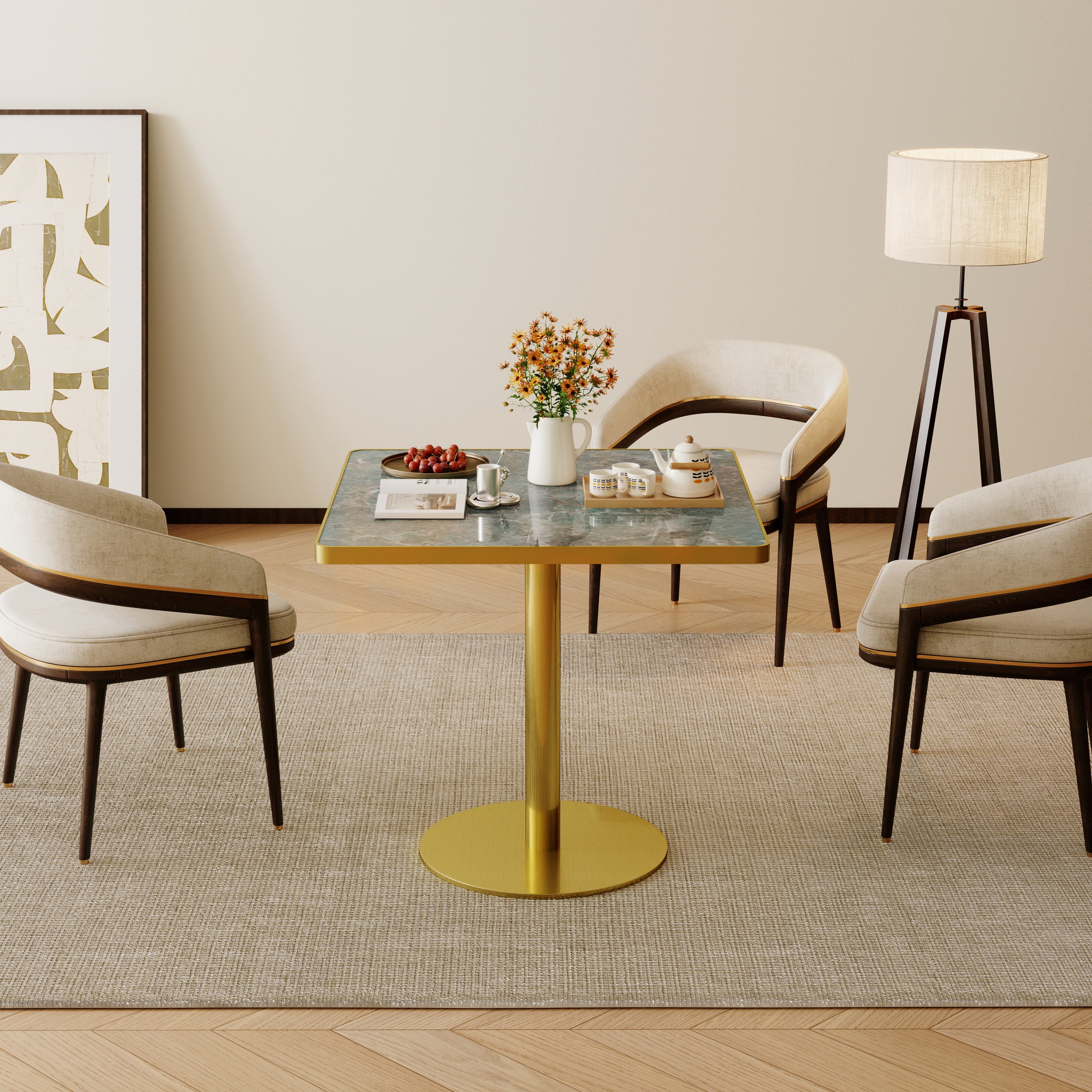 Green stone square dining table with gold base in styled living room with floor lamp