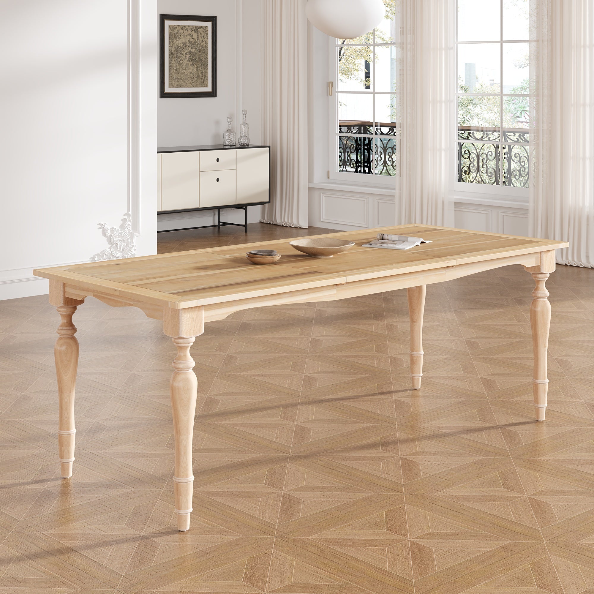 Extendable rubberwood dining table with turned legs styled in a bright room with wood bowls