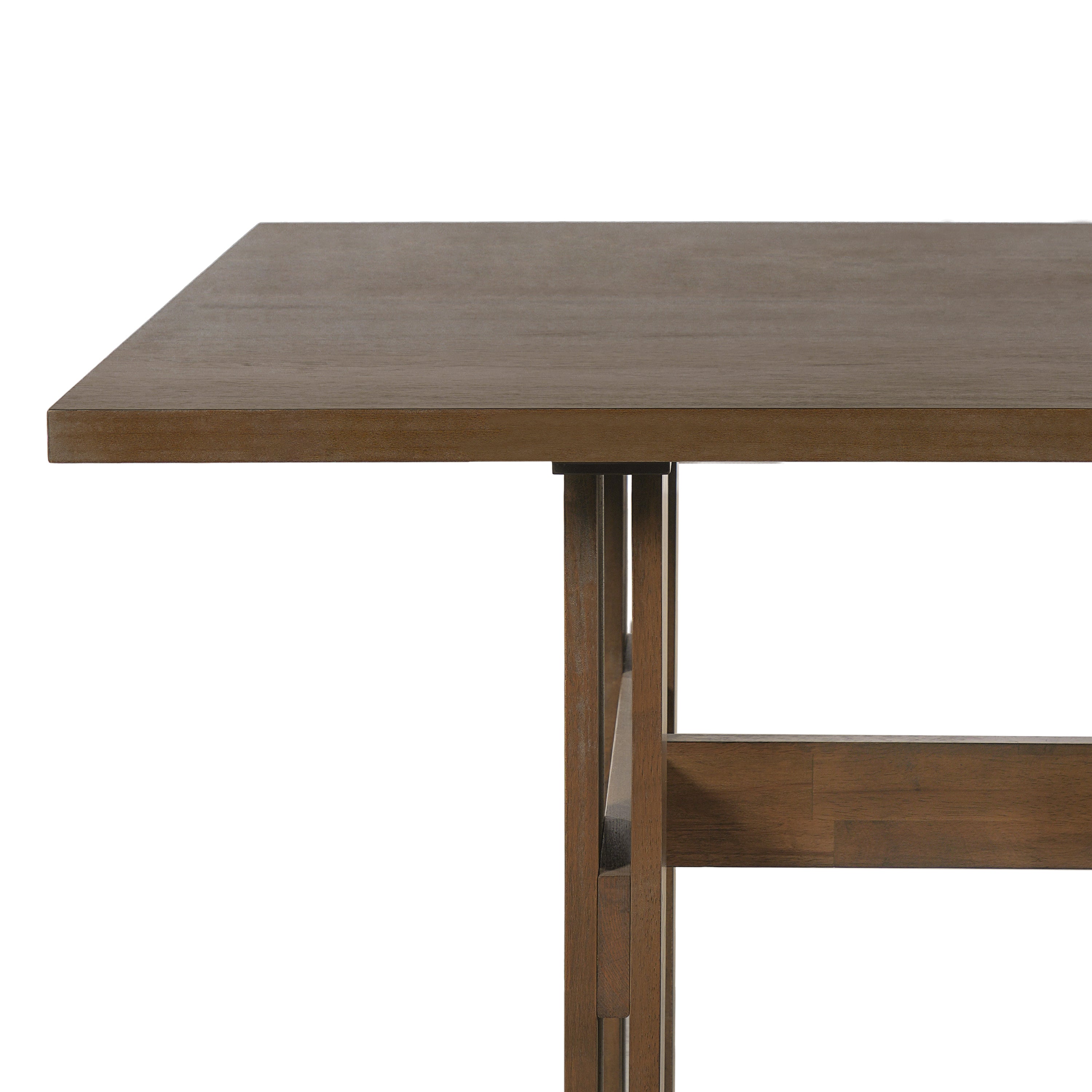 Close-up of a tabletop corner and split-board leg on the walnut-tone dining table, white background