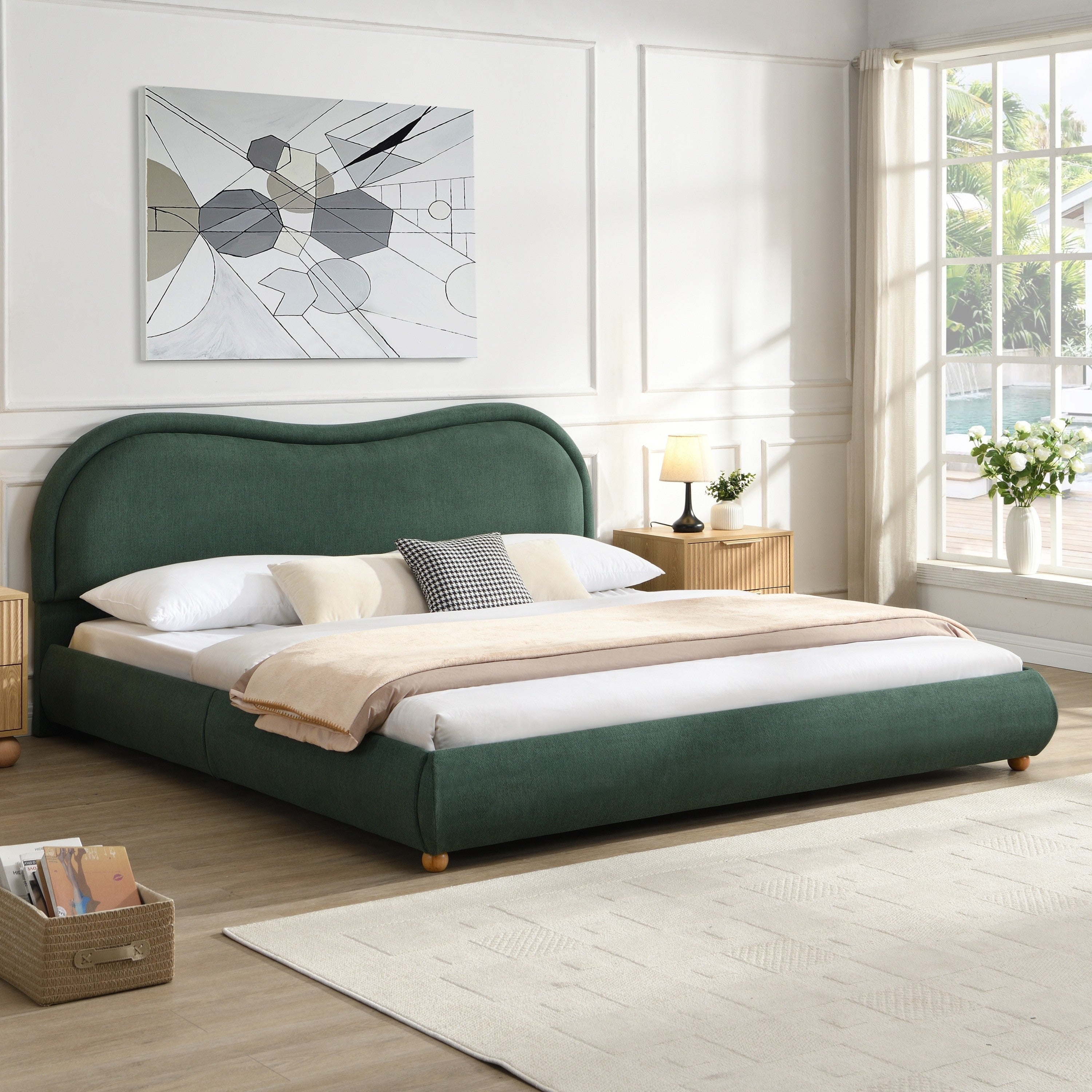 Olive green king bed frame in bright bedroom with woven basket
