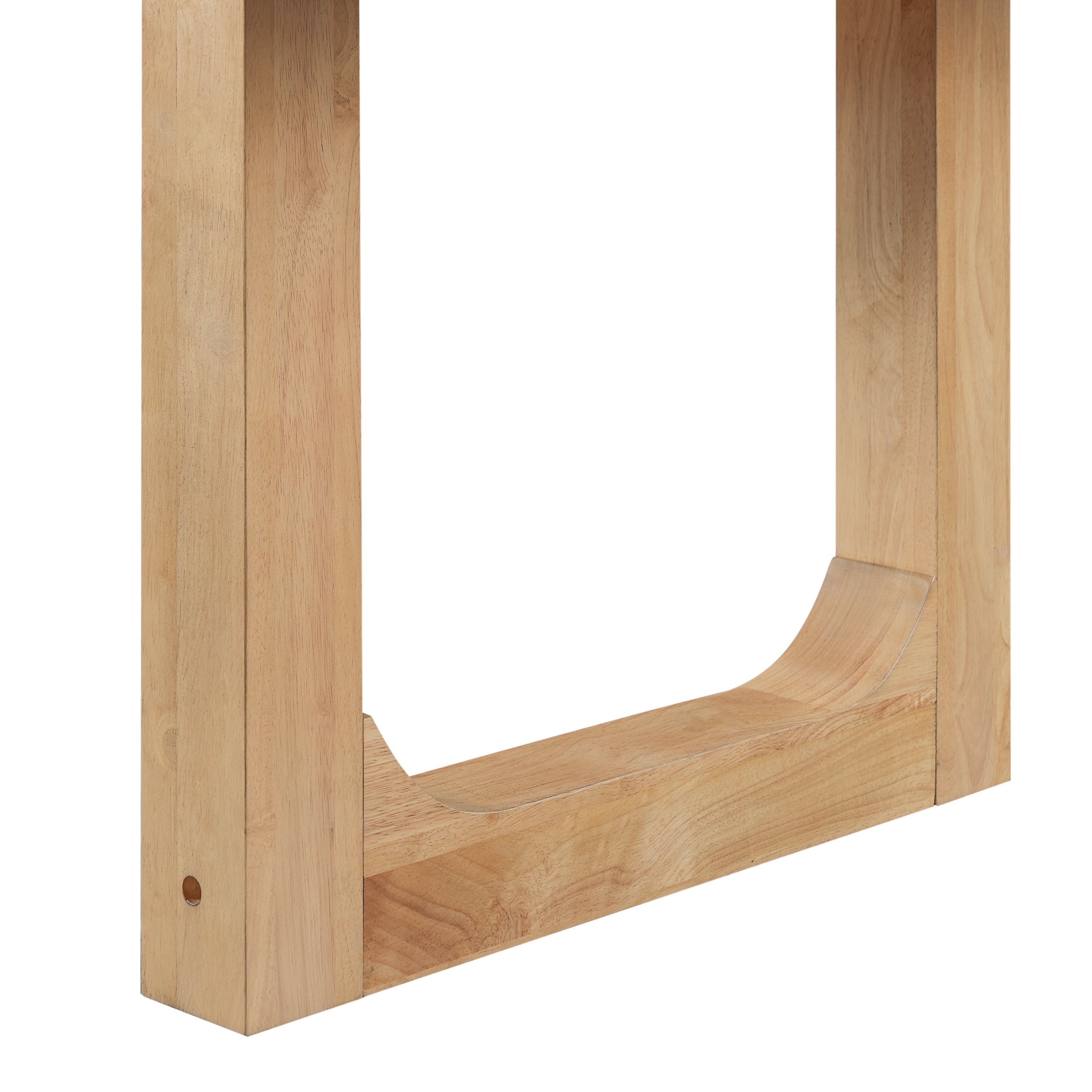 Close-up of the curved U-shaped oak leg base of the dining table on white