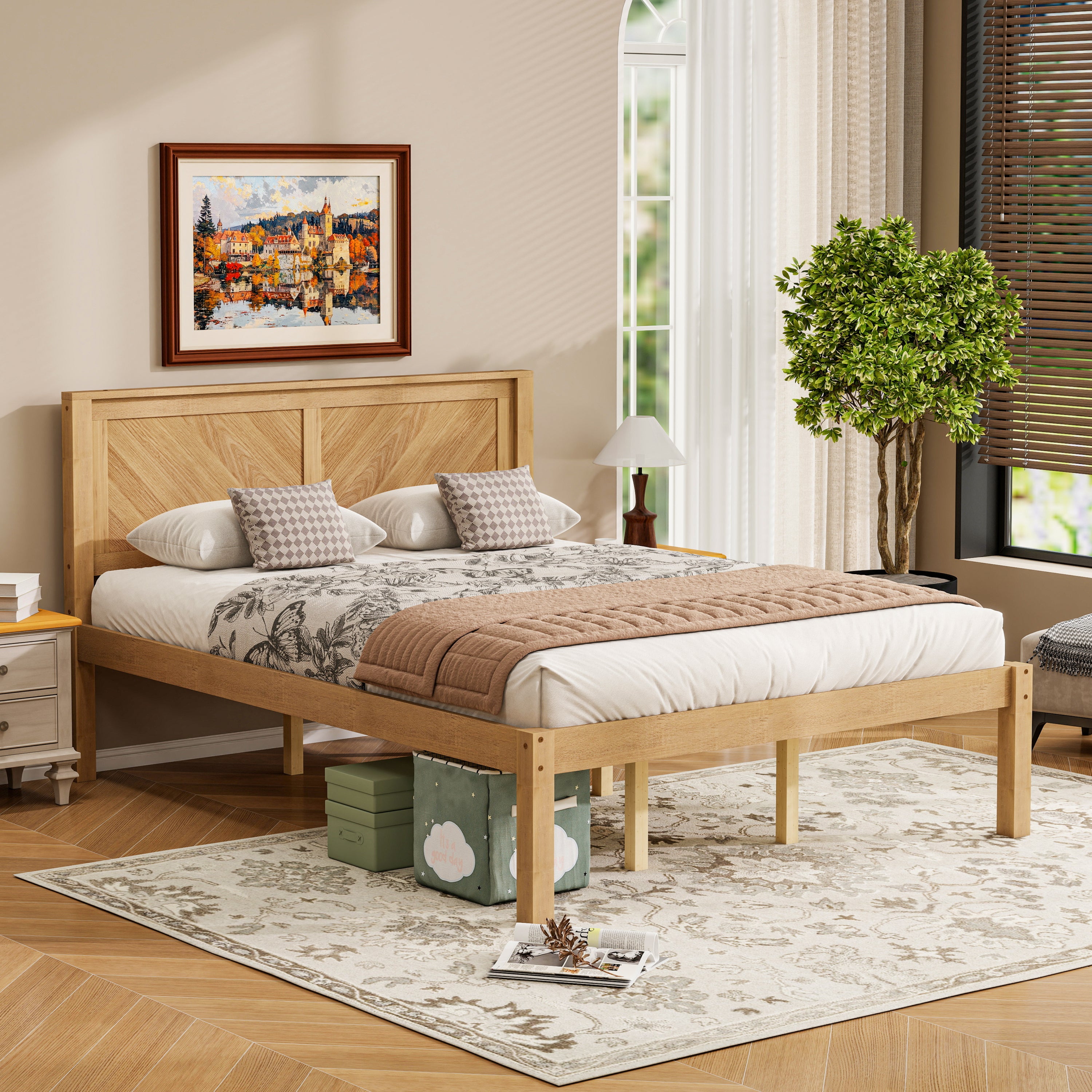 Natural oak chevron headboard bed styled in a sunny bedroom with a lamp and framed art