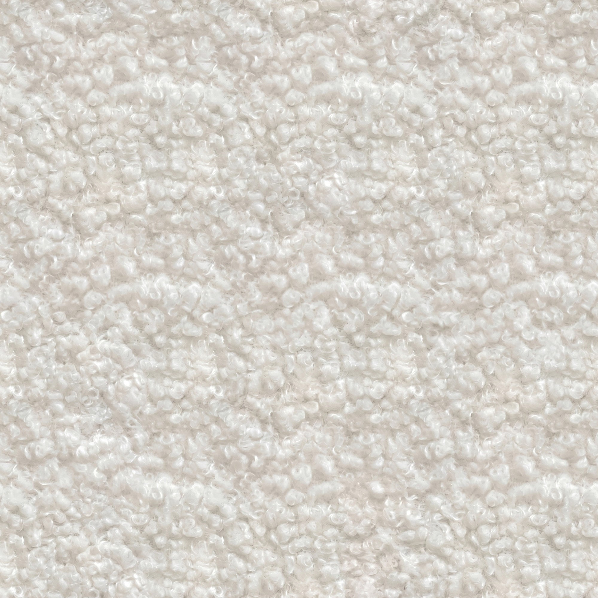 Macro swatch of the soft cream upholstery fabric on the vintage queen bed headboard