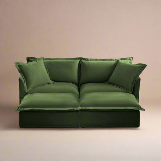 straigt forward image of a comfortable couch made of olive chenille showing the machine washable slipcovers that are pet friendly