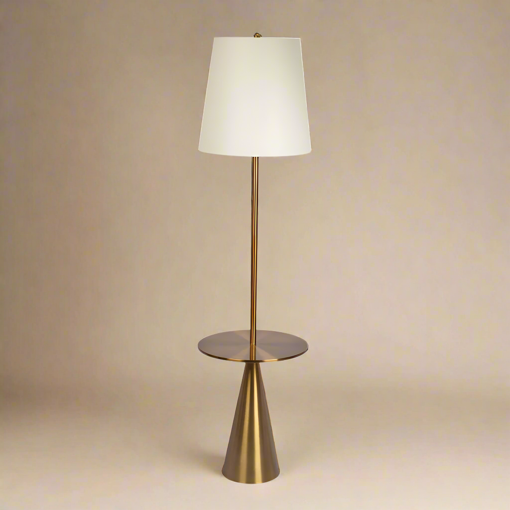 straight photo of a mid century brass floor lamp with an end table built in feature and a lamp shade