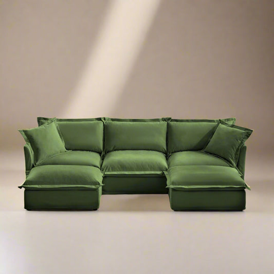 front shot of three seat modular sectional sofa with two ottomans showing the beautiful olive color, machine washable slipcovers, pet friendly chenille fabric, and mid century modern design