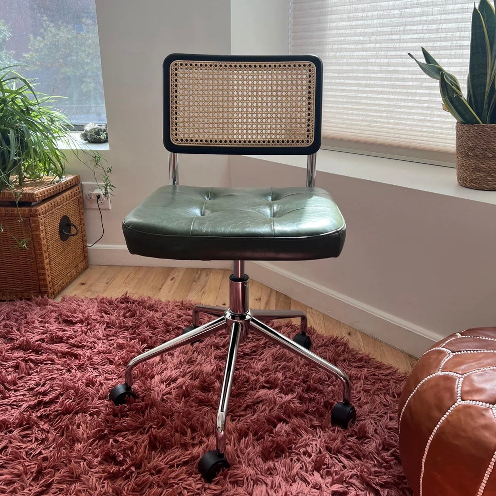 green vegan leather seat with black wood back rest and stainless steel frame