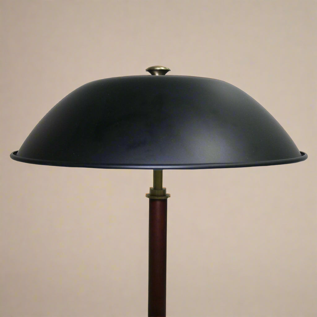 closeup of the umbrella shade design on a black mid century modern table lamp