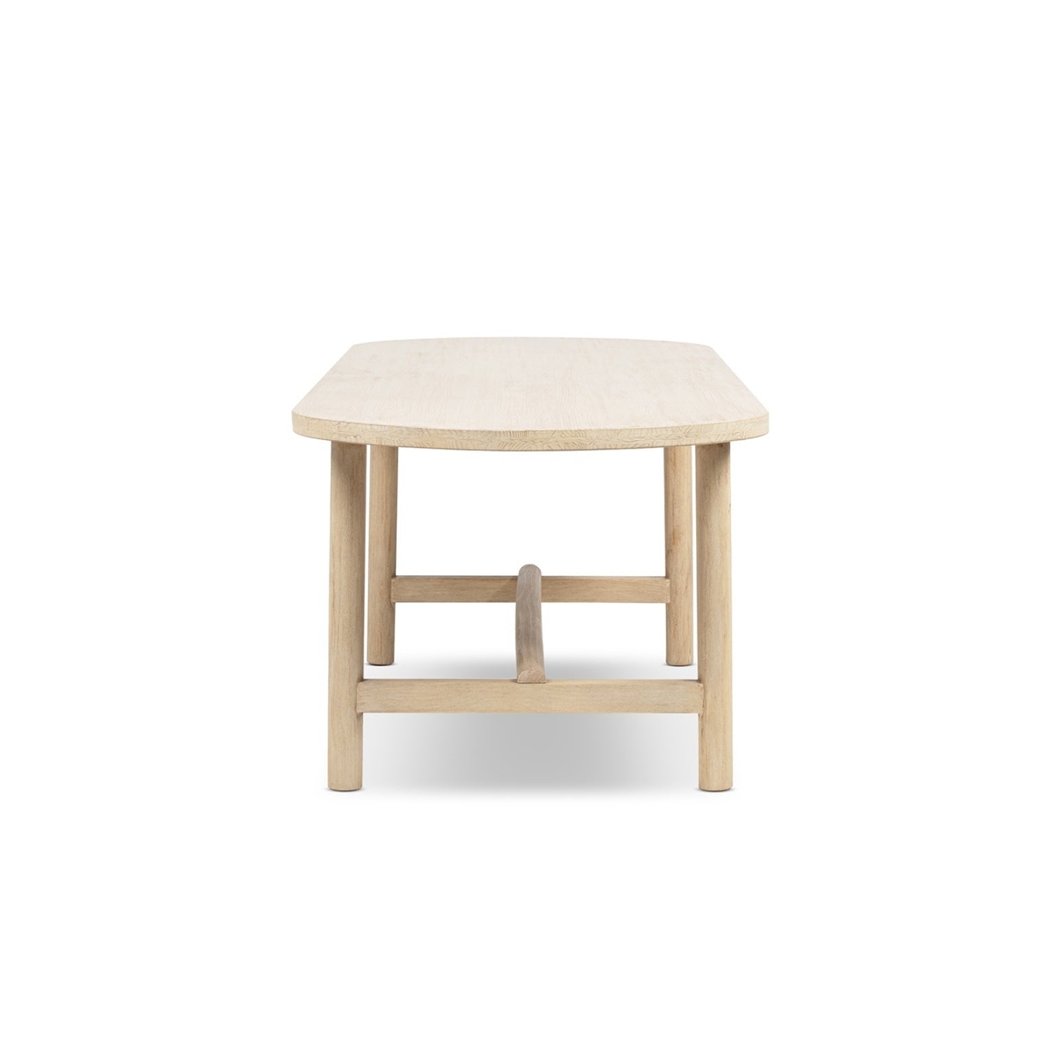 Natural cerused pine oval dining table, end view on white studio background