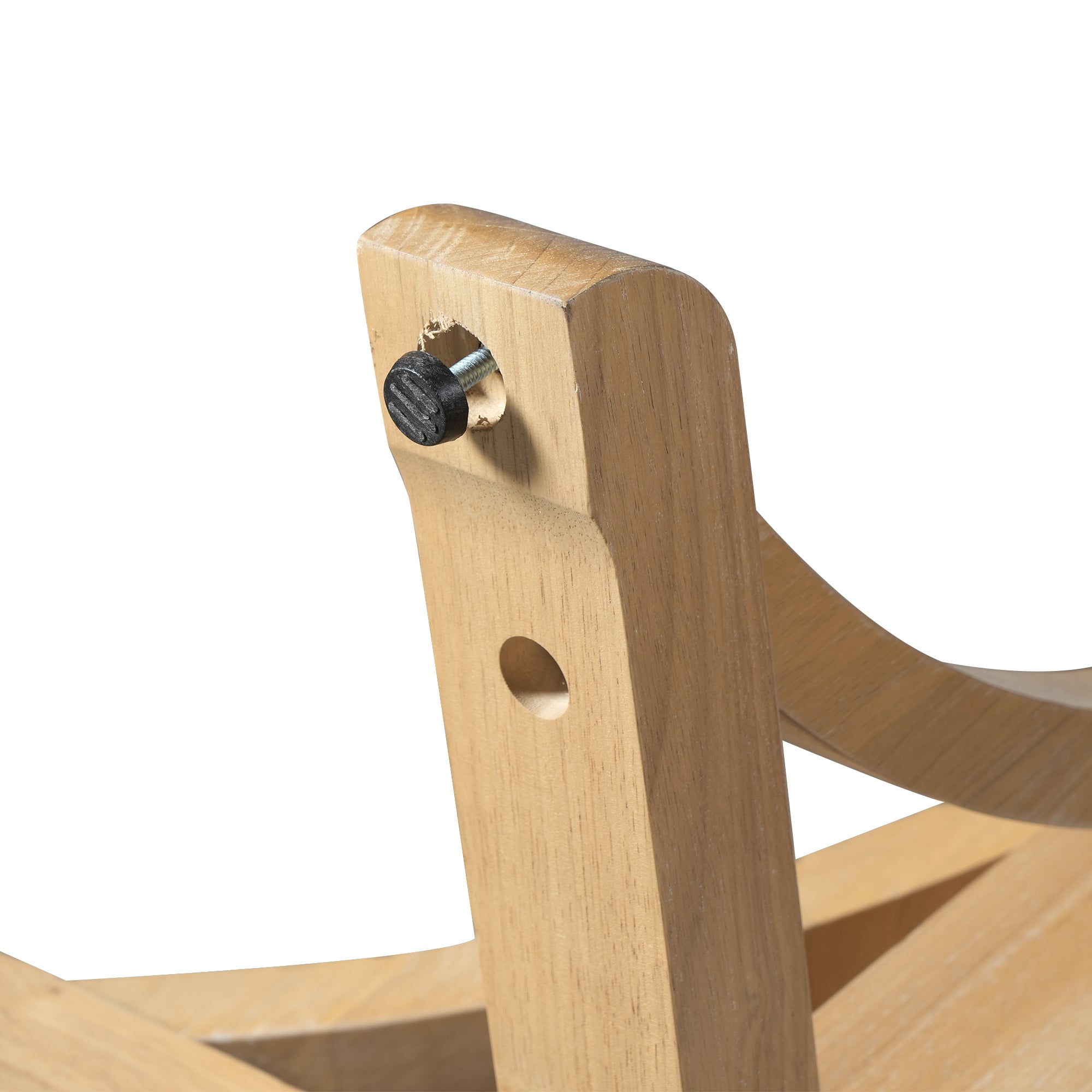 Close-up of the leg-to-base joint with black adjustable leveling foot bolt on the wood trestle table