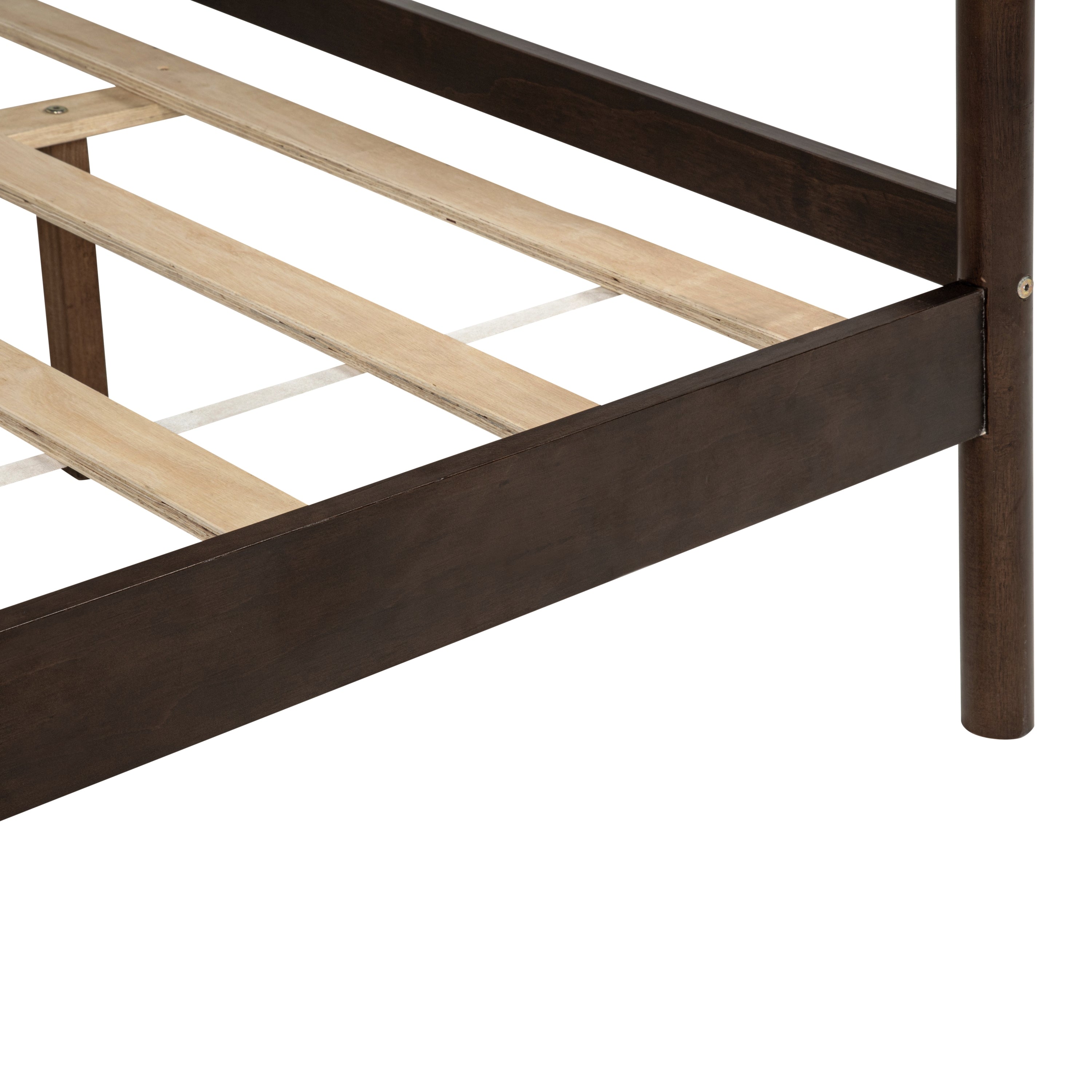 Front view of bare king bed frame on white background